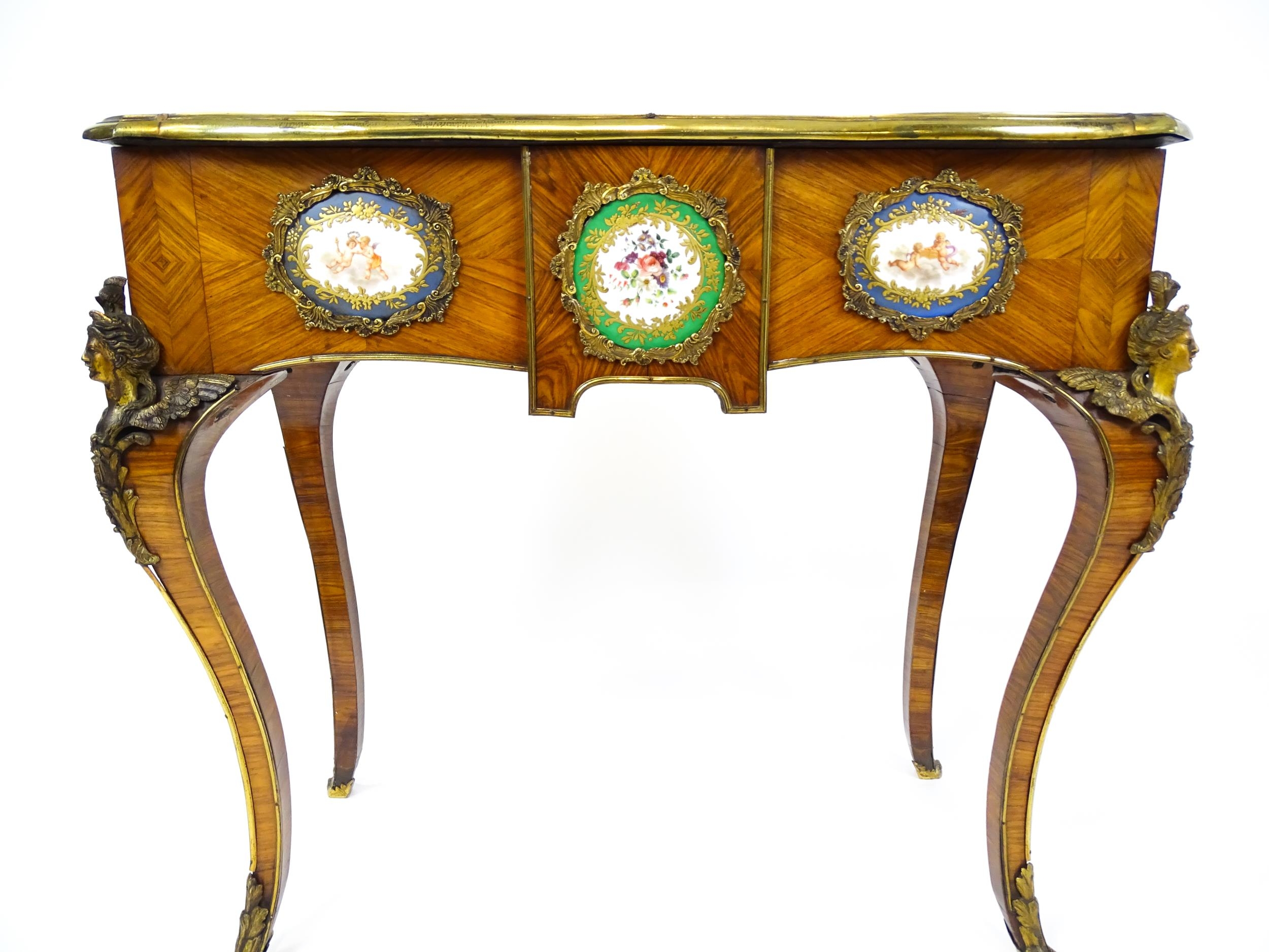 A mid 19thC kingwood side table with a brass moulding to the top edge and three Sevres style plaques - Image 8 of 14