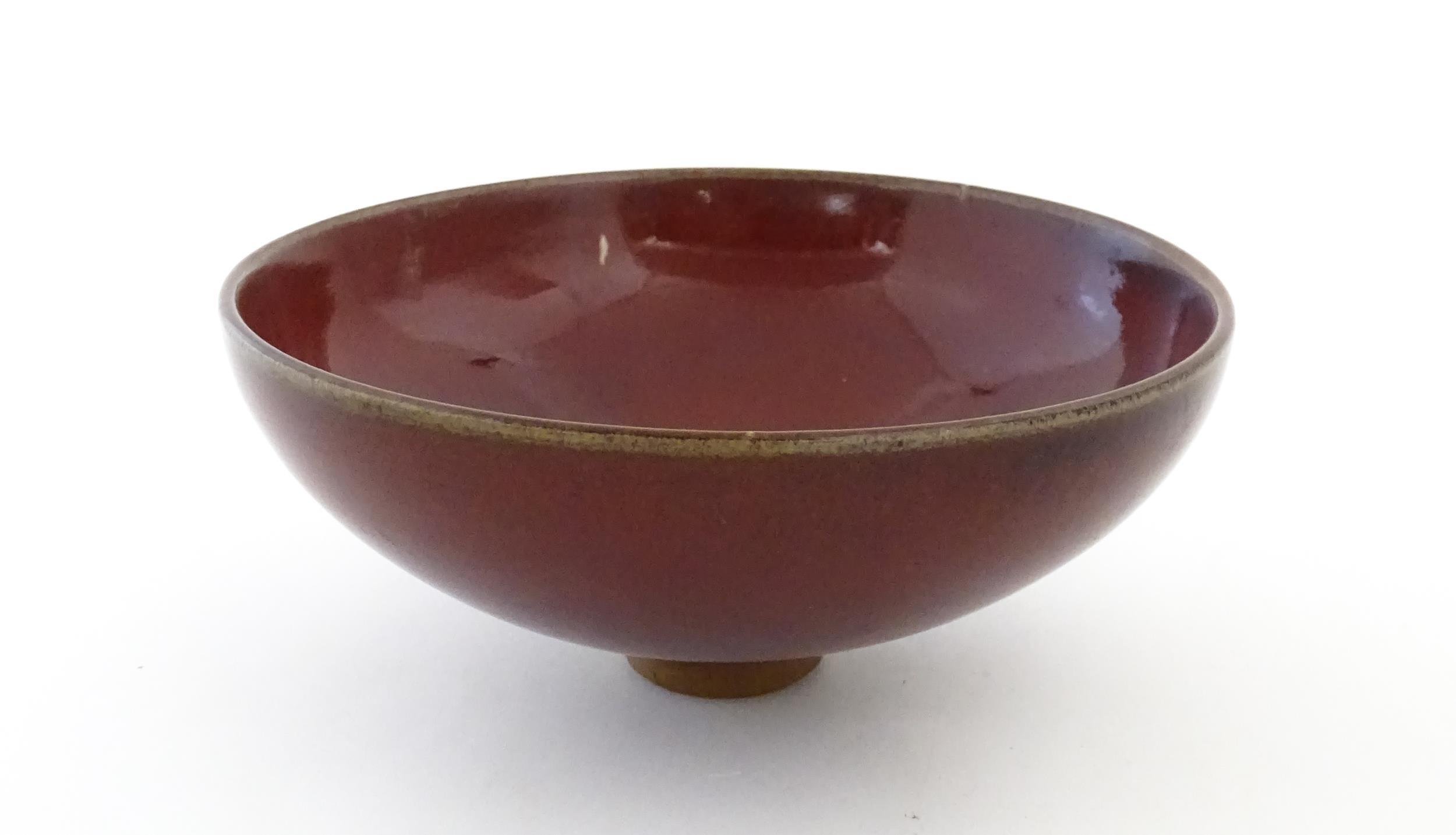 A Chinese sang de boeuf footed bowl. Approx. 2 3/4" high x 6 1/2" diameter Please Note - we do not - Image 4 of 7