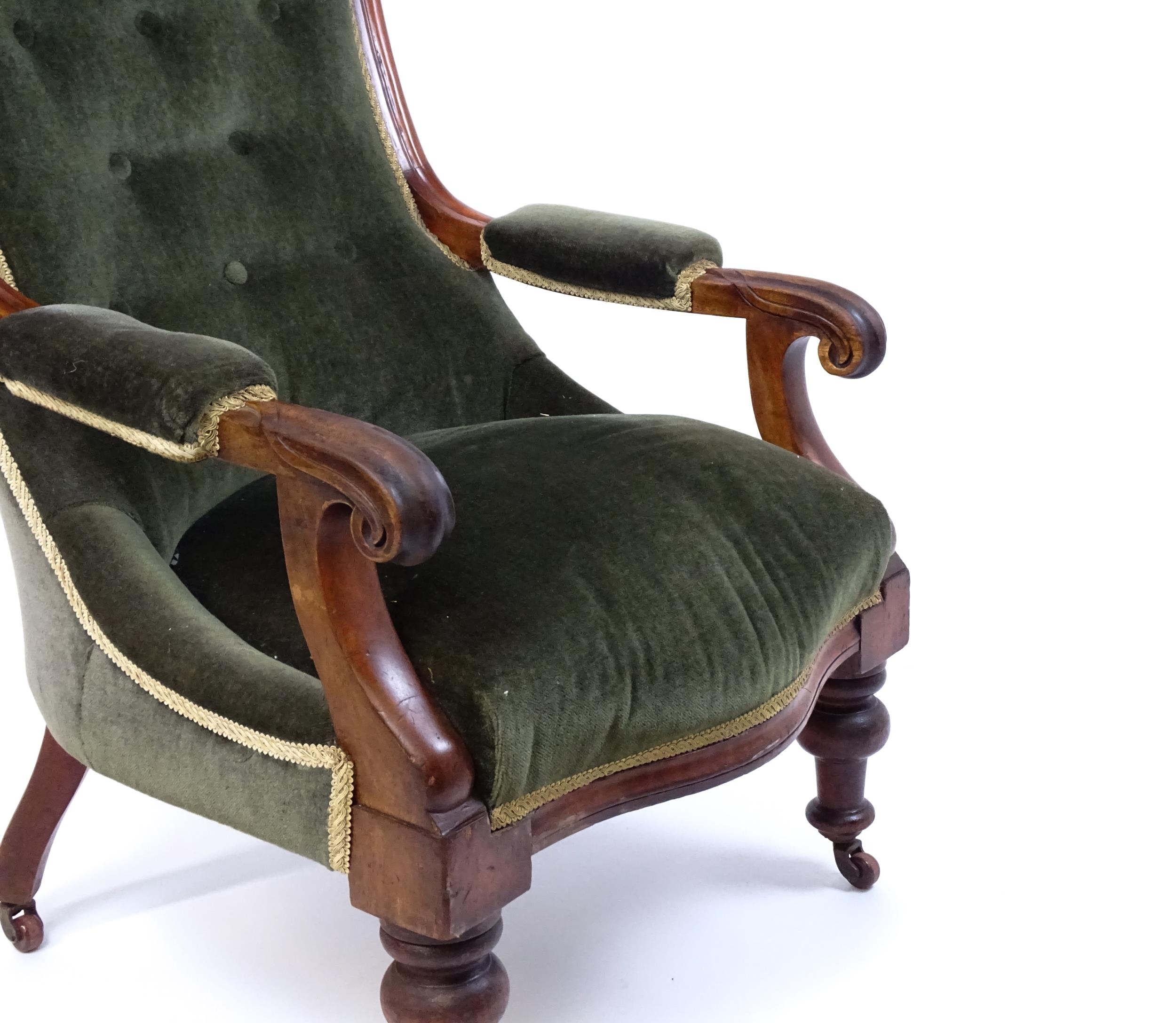 A 19thC mahogany open armchair, the spoon back design having a moulded frame and deep buttoned - Image 4 of 8