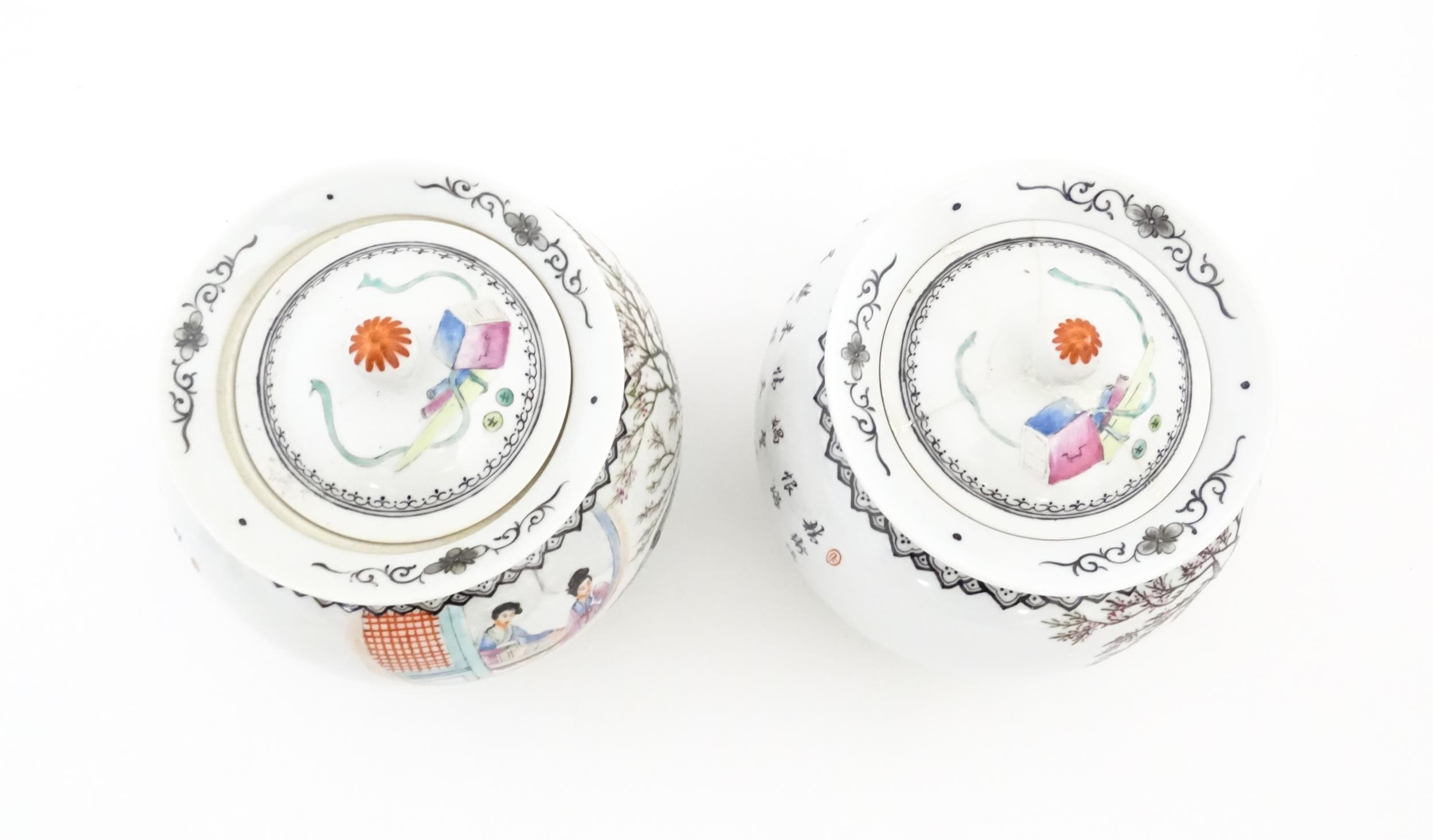A pair of Chinese pot and cover vases decorated with ladies in a landscapes, and Character script. - Image 8 of 10