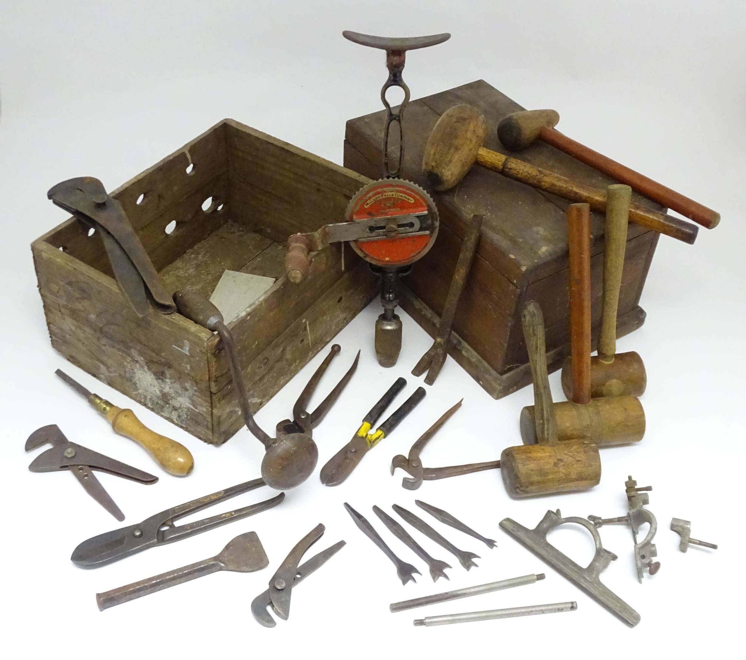 A quantity of assorted mid 20thC tools, to include hand drills, fencing pliers, mallets,