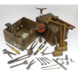 A quantity of assorted mid 20thC tools, to include hand drills, fencing pliers, mallets,