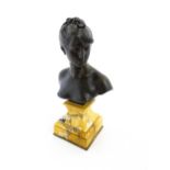 A 19thC cast bronze bust of the goddess Diana, after Mathurin Moreau, raised on a marble socle. Cast