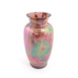 A lustre studio art glass vase in manner of Favrile. Approx. 8 3/4" high Please Note - we do not