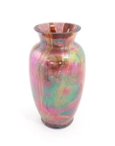 A lustre studio art glass vase in manner of Favrile. Approx. 8 3/4" high Please Note - we do not