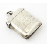 A silver vesta case engraved 'Ashby W Warner, Norton, Stockton on Tees', hallmarked Chester 1900,