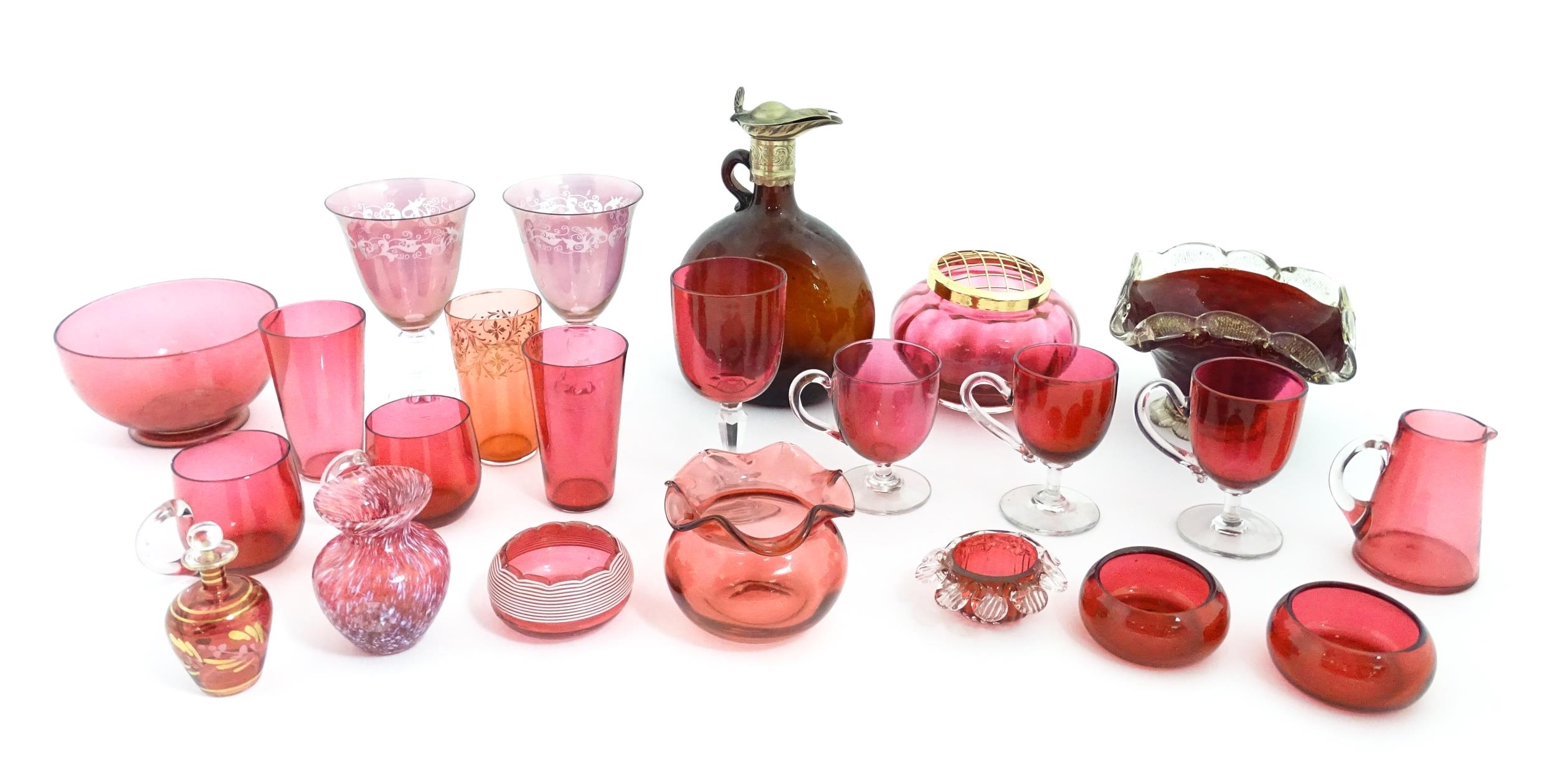 A quantity of Victorian and later assorted glassware to include cranberry glass beakers, drinking