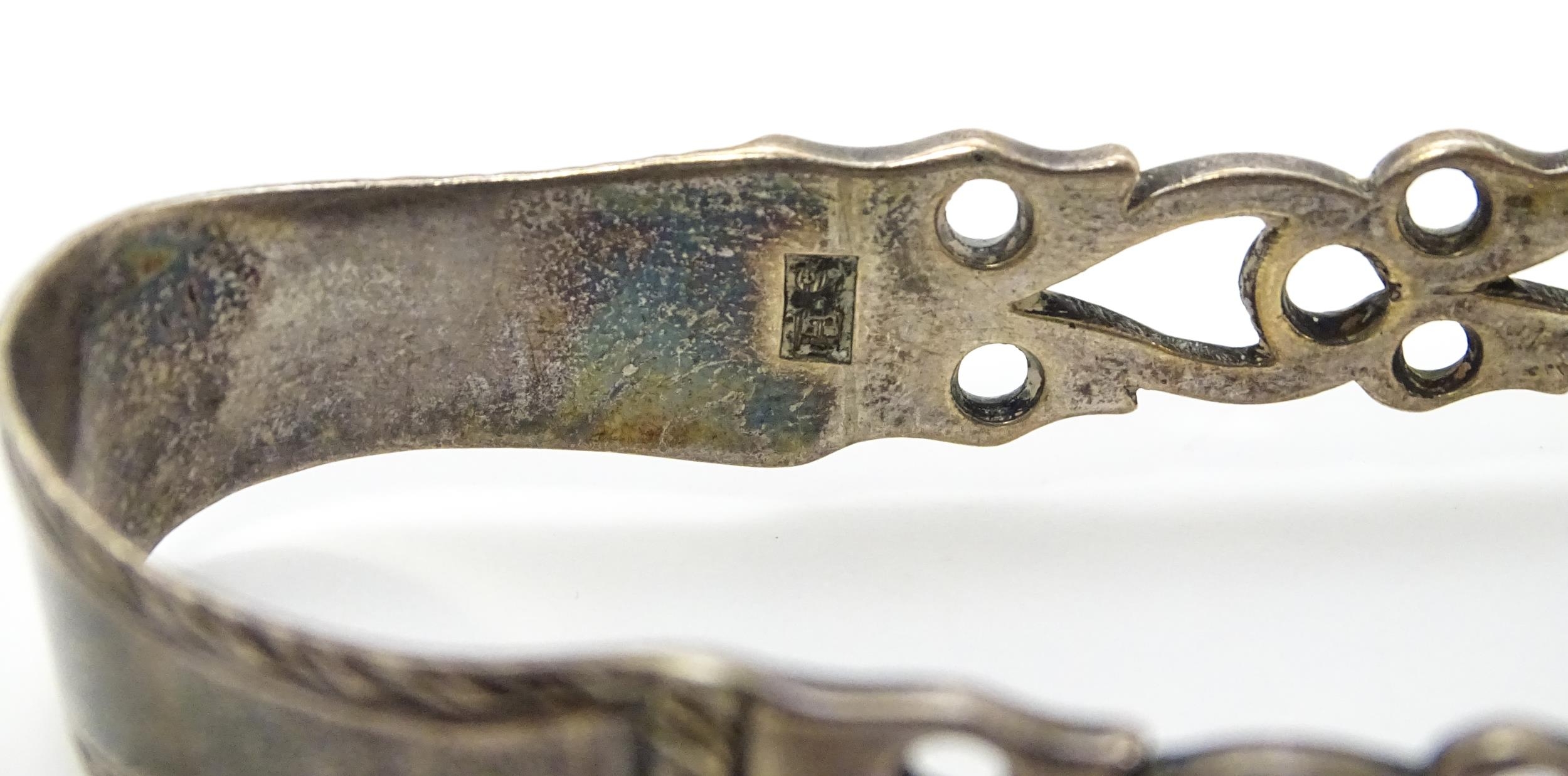 A Victorian silver knife rest hallmarked Sheffield 1898, maker John Round & Son Ltd. Together with - Image 13 of 13