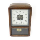 Bulle : A French Art Deco oak cased electric mantel clock by Bulle. The dial signed Bulle Patent