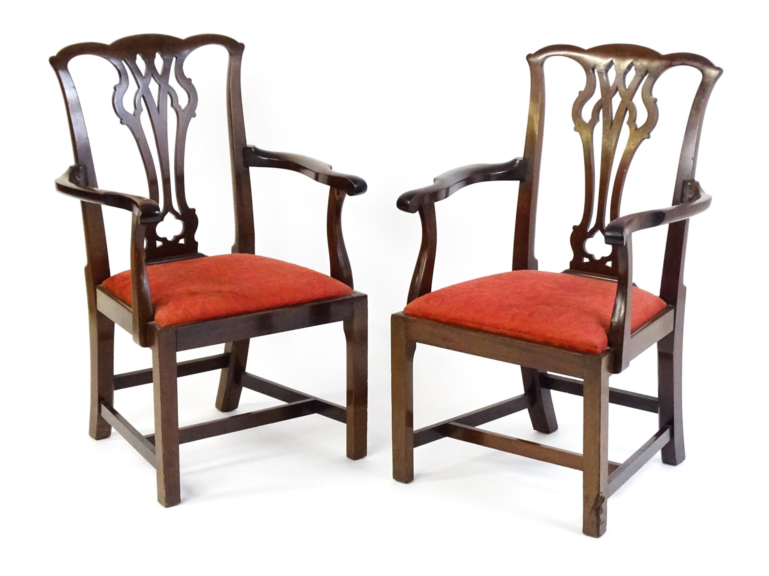 A pair of Chippendale style mahogany elbow chairs with a drop in seat raised on chamfered legs - Image 6 of 7