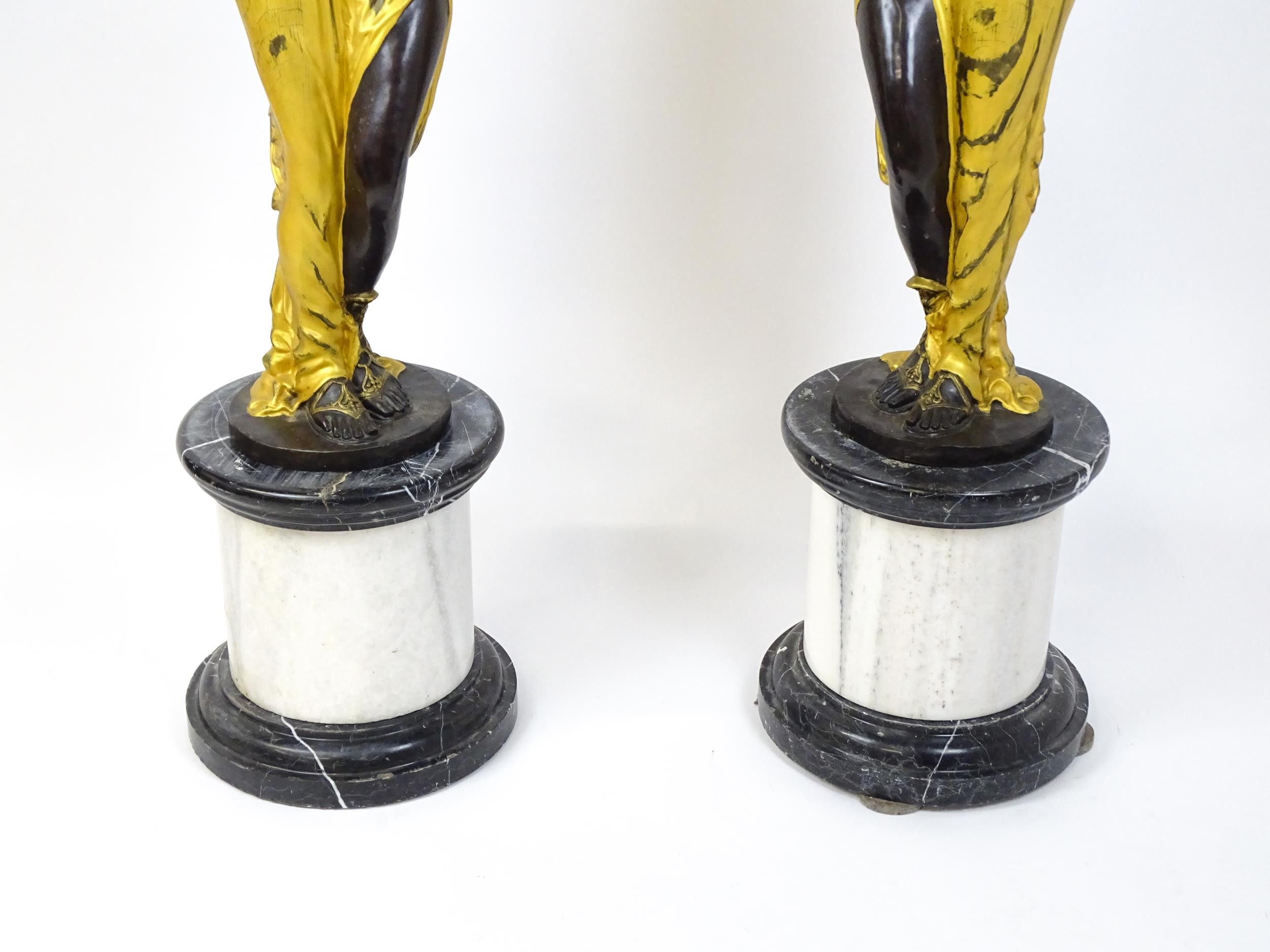 A pair of large cast bronze female blackamoor torcheres with gilt detail, raised on marble - Image 5 of 15