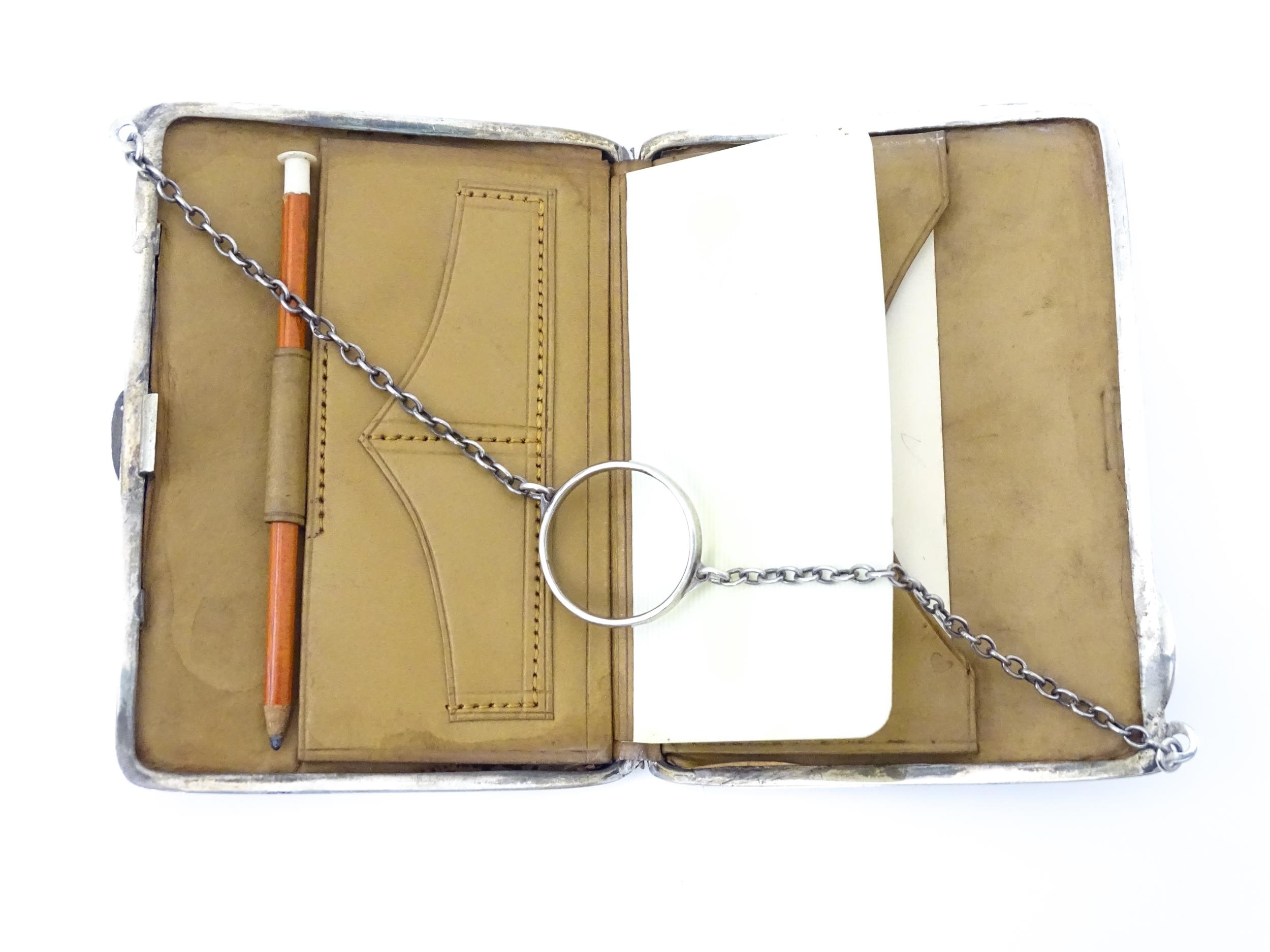 A silver purse / dance card case with leather lined interior. Hallmarked Birmingham, 1915 maker - Image 8 of 8