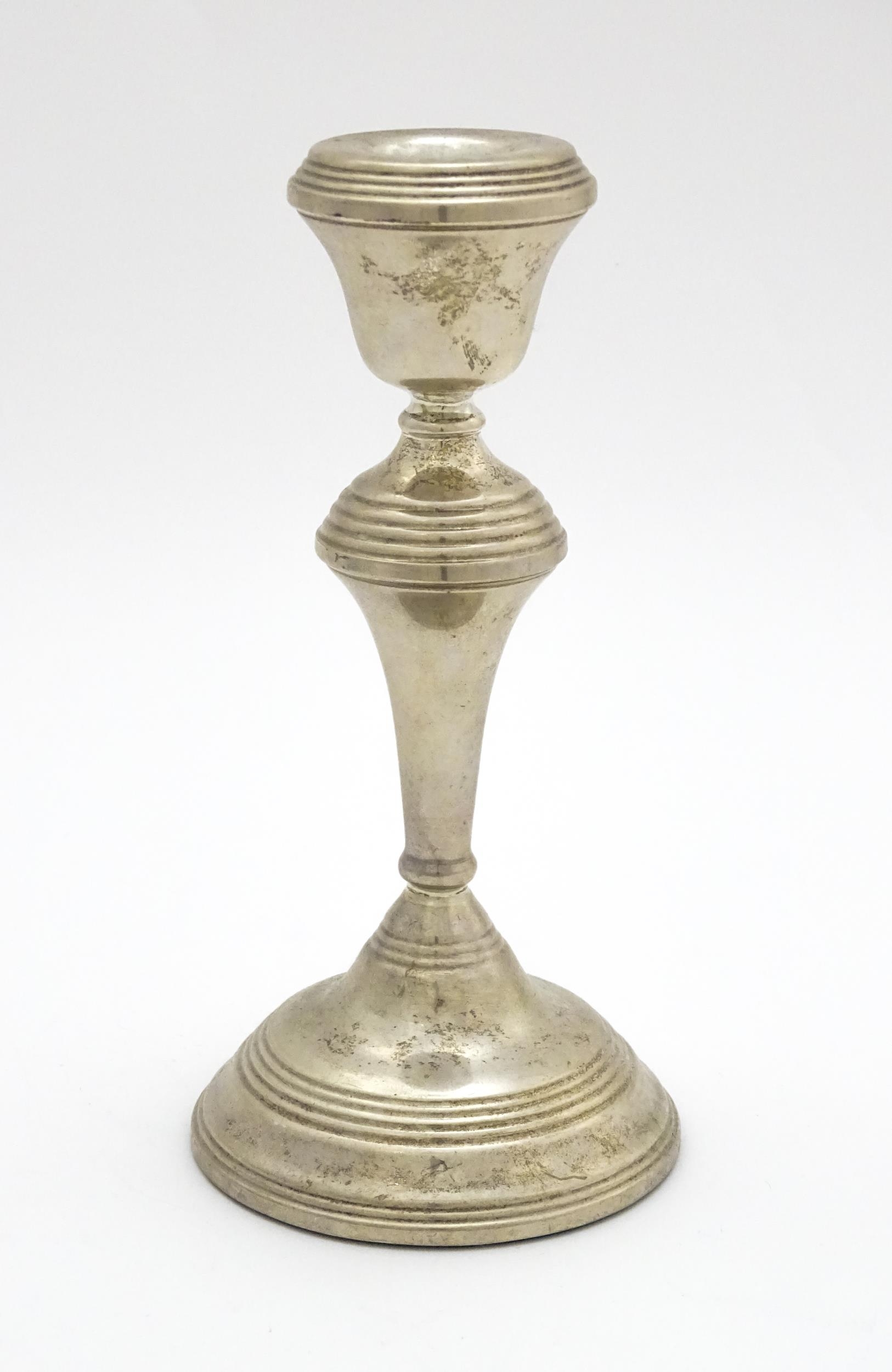 A silver candlestick hallmarked Birmingham 1973, maker W. I. Broadway. Approx. 7 1/4" high Please - Image 5 of 6