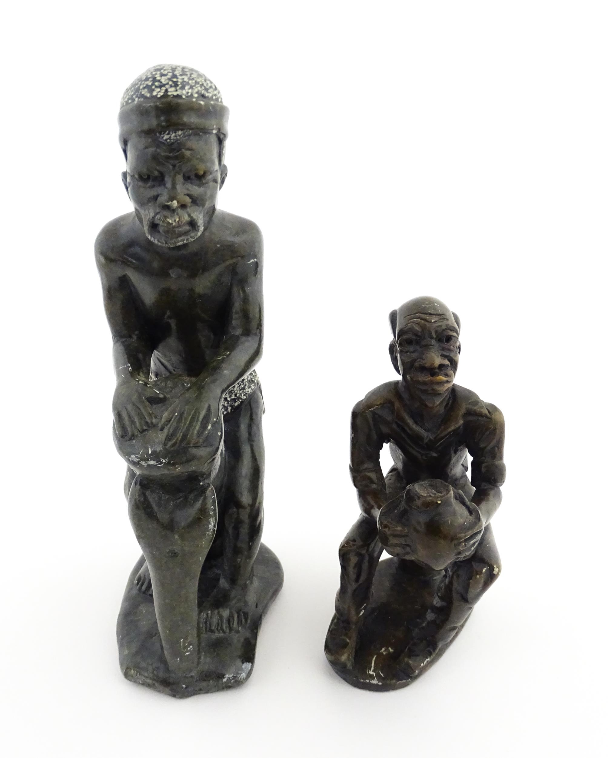 Ethnographic / Native / Tribal : An African soapstone carving modelled as a tribesman playing a - Image 2 of 6