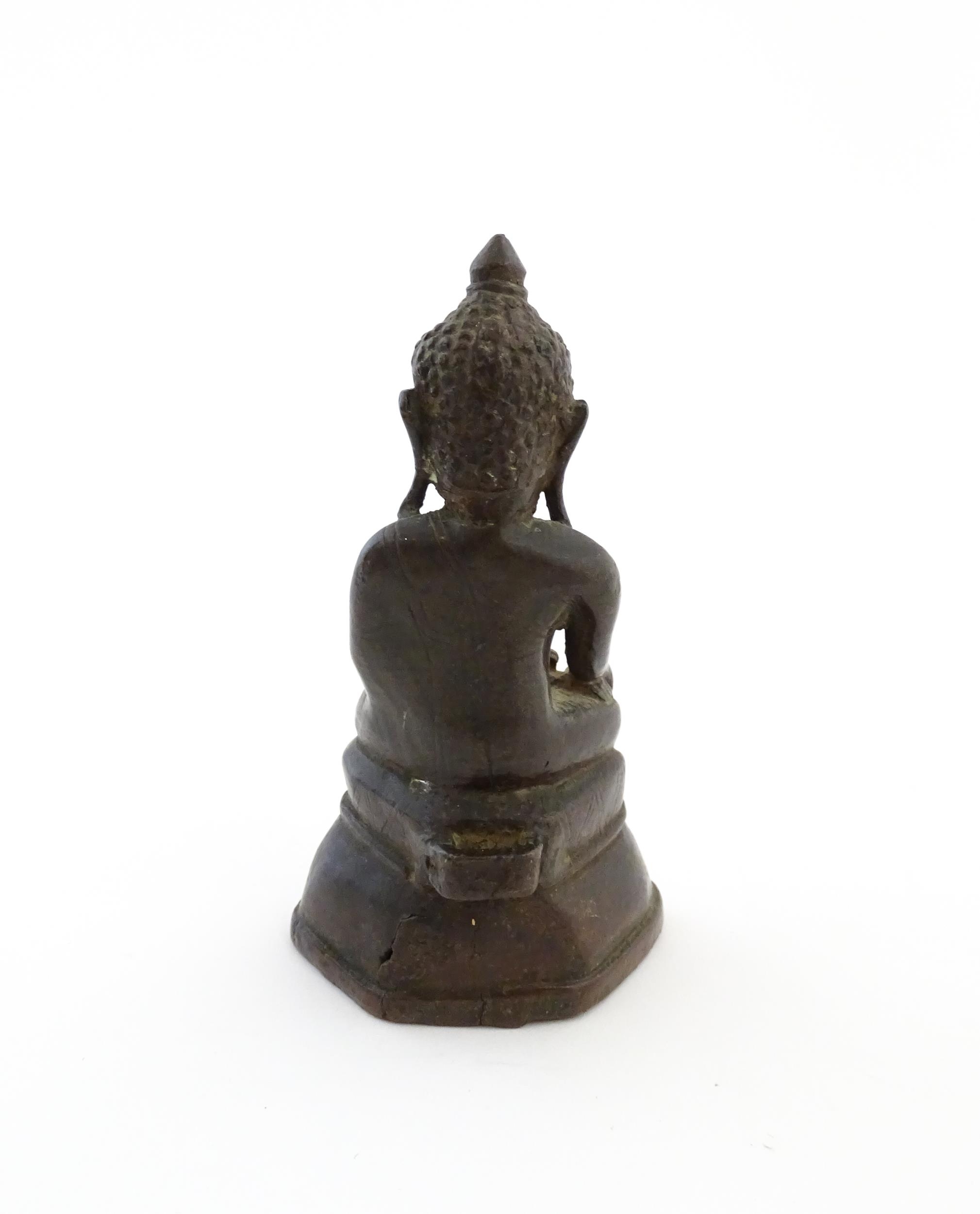 An Asian cast sculpture modelled as a seated Buddha. Approx. 5" high Please Note - we do not make - Image 4 of 6