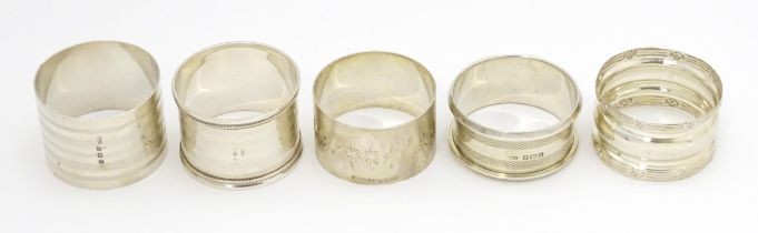 Five assorted napkin rings hallmarks to include Birmingham 1914, 1920, 1921, 1922 and 1923 (5)