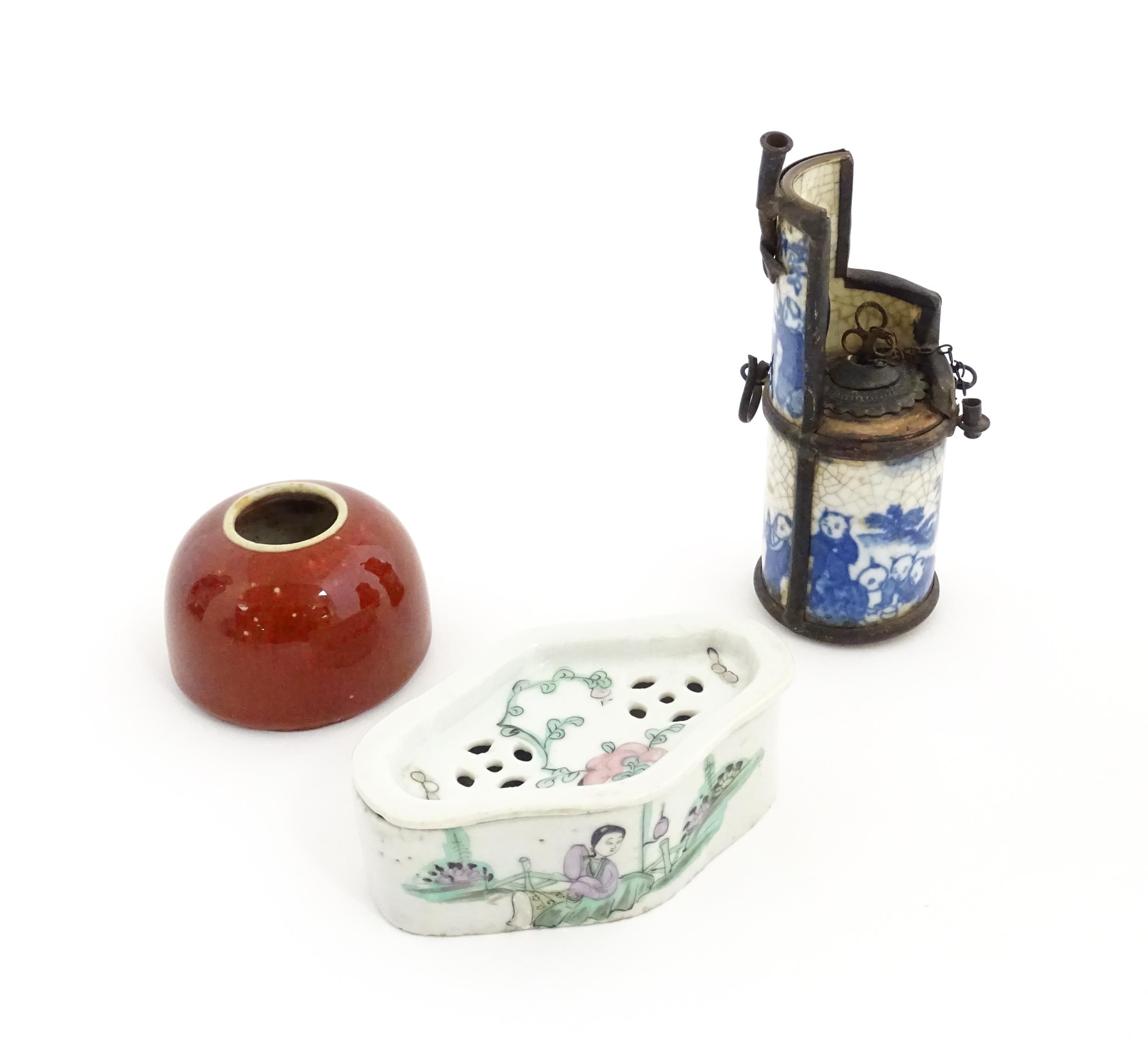 Three Chinese items comprising a cricket box decorated with a figure, flowers and Character