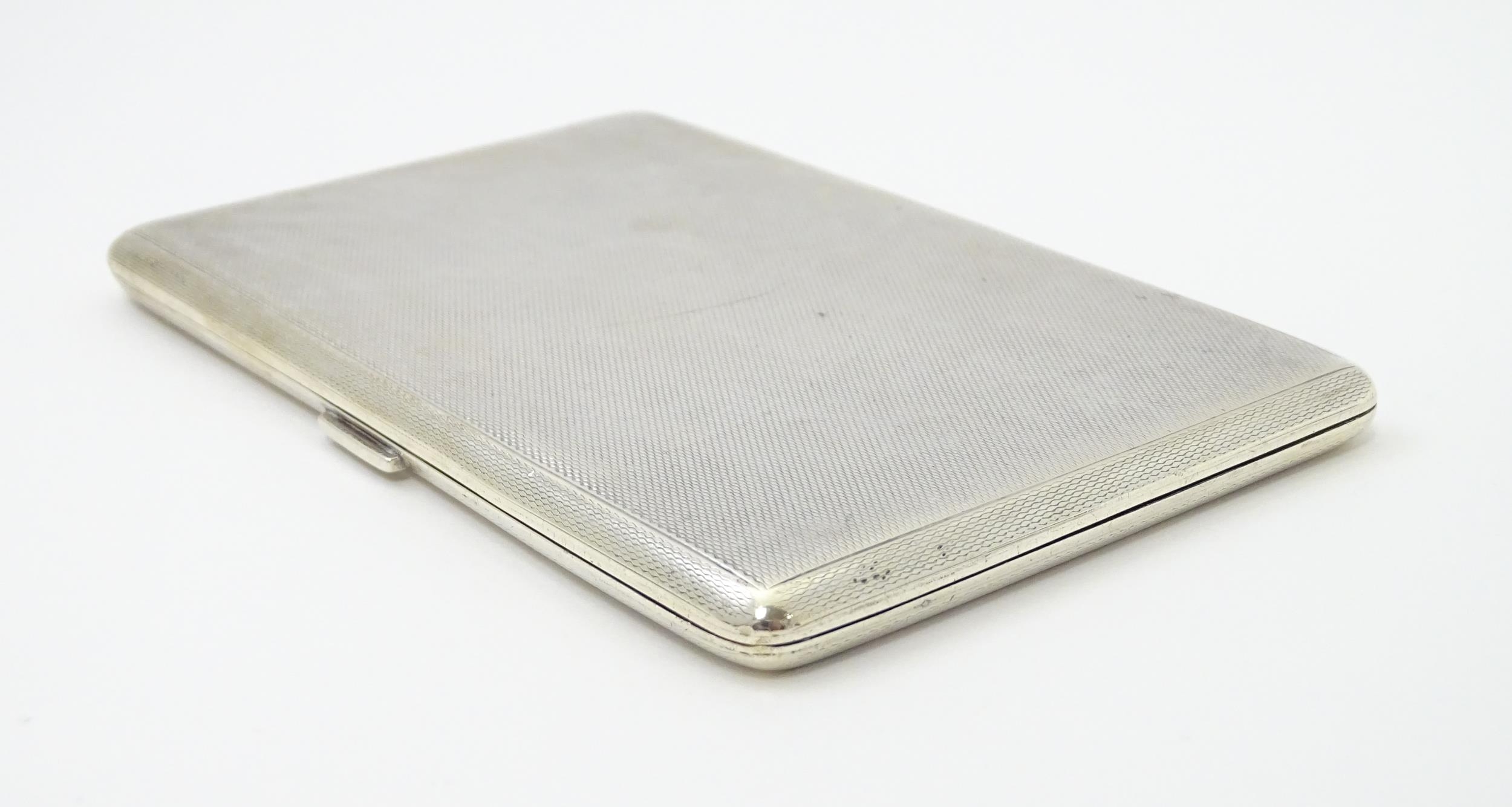 An Art Deco silver cigarette case with three sectional interior hallmarked Birmingham 1933, maker - Image 4 of 11