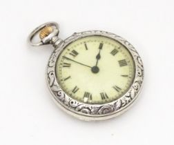 A silver cased top wind fob watch with import marks for London 1913, with white enamel dial having