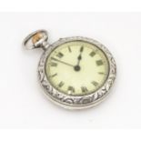 A silver cased top wind fob watch with import marks for London 1913, with white enamel dial having