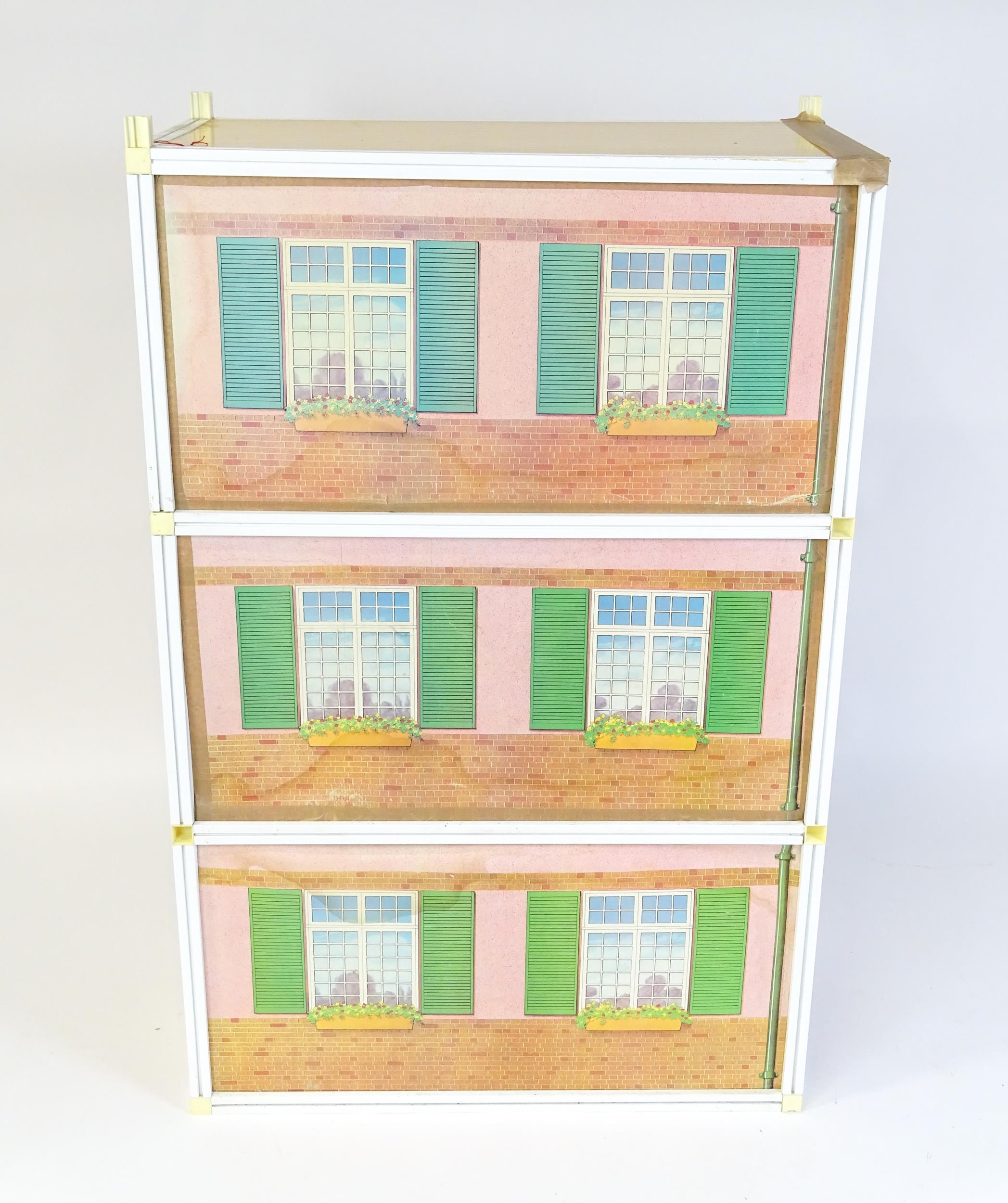 Toys: A 20thC Sindy three storey dolls house with open front, with Sindy furniture to include - Image 2 of 21