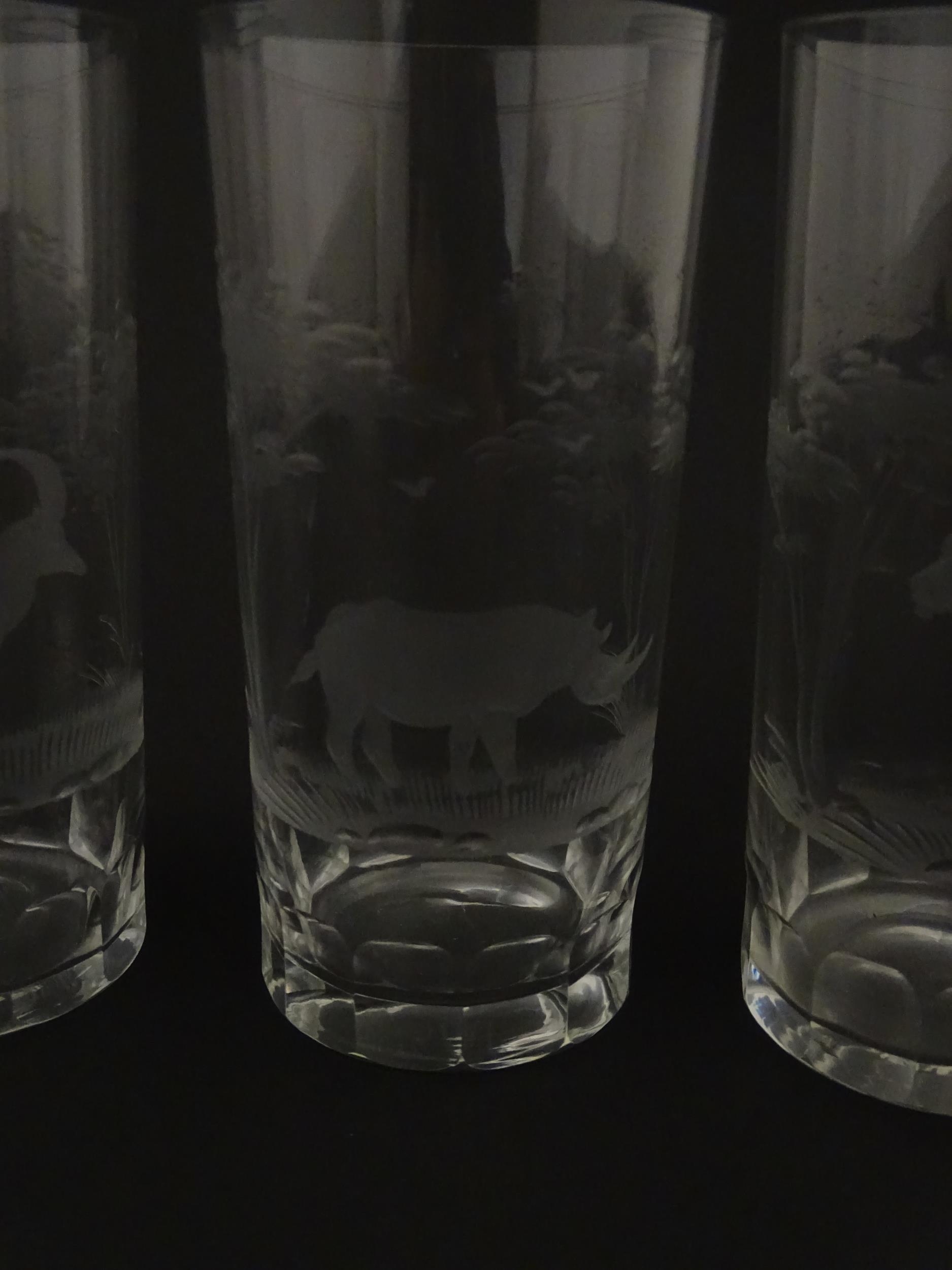 Six Rowland Ward highball glasses with engraved Safari animal detail. Unsigned. Approx. 5 1/2" - Image 8 of 17