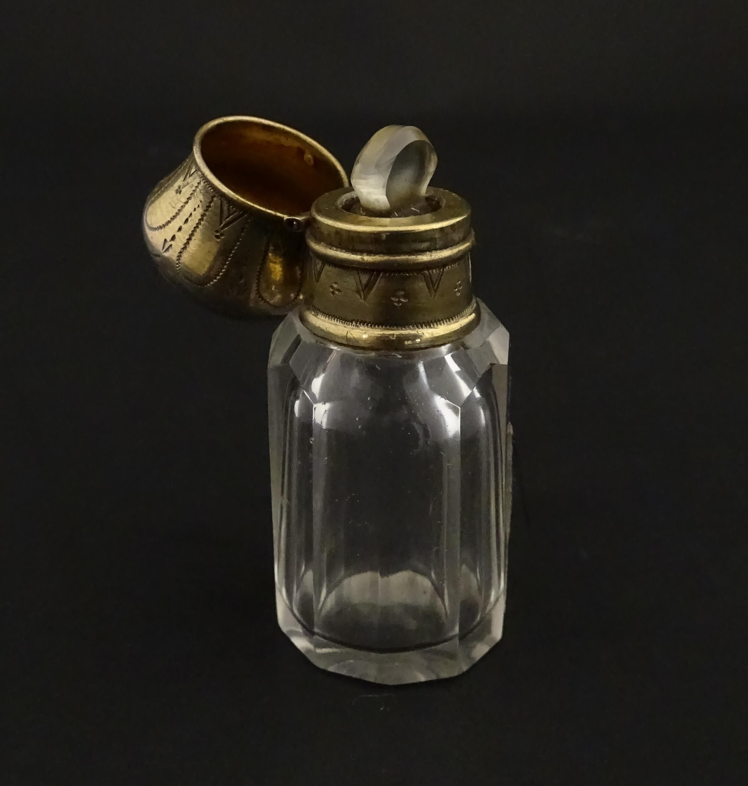 A French scent / perfume bottle with silver gilt top. Approx. 2 1/4" high Please Note - we do not - Image 5 of 10