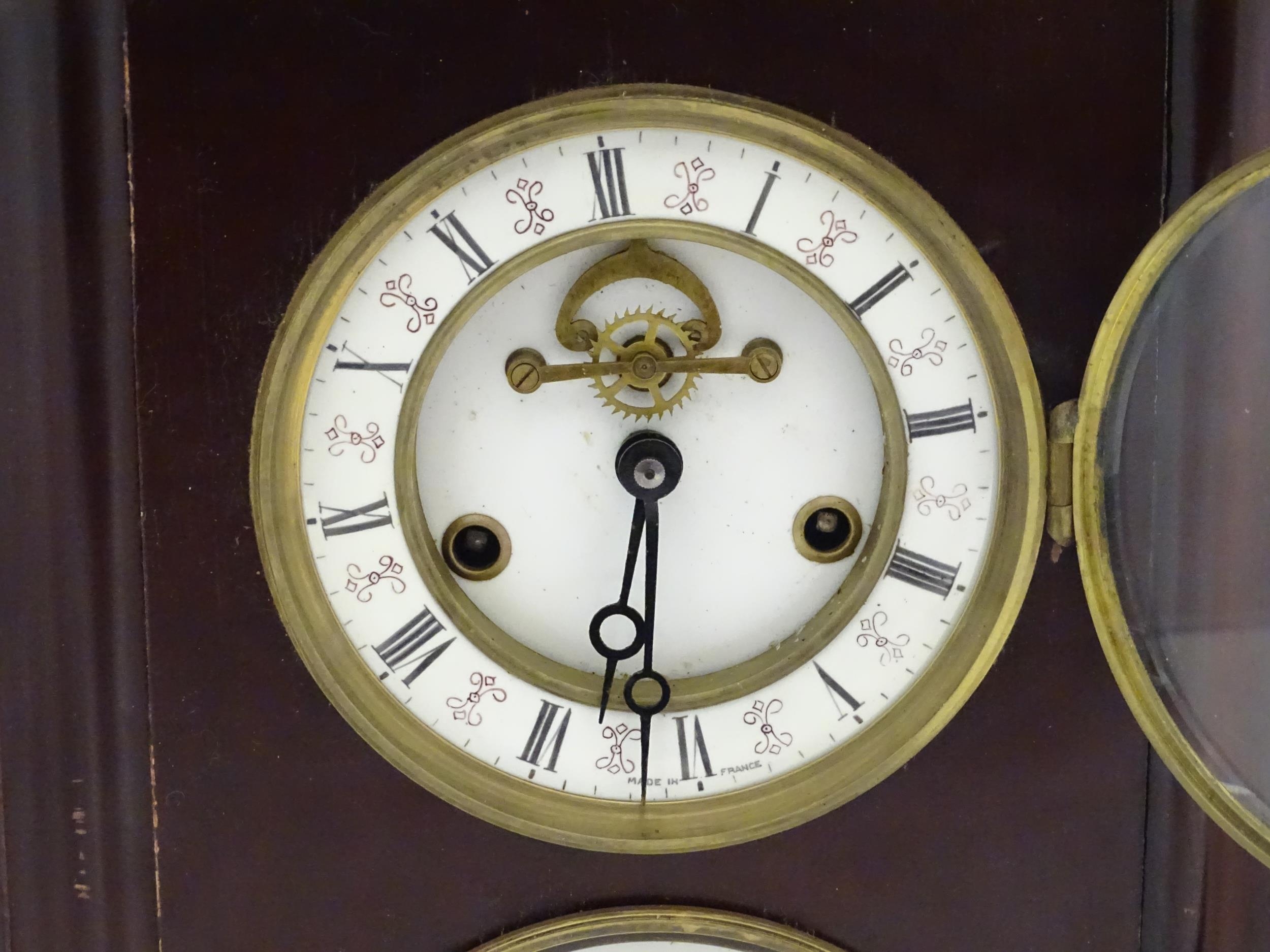 A French perpetual calendar clock, the wooden cased mantle clock having two piece enamel dial with - Image 6 of 10