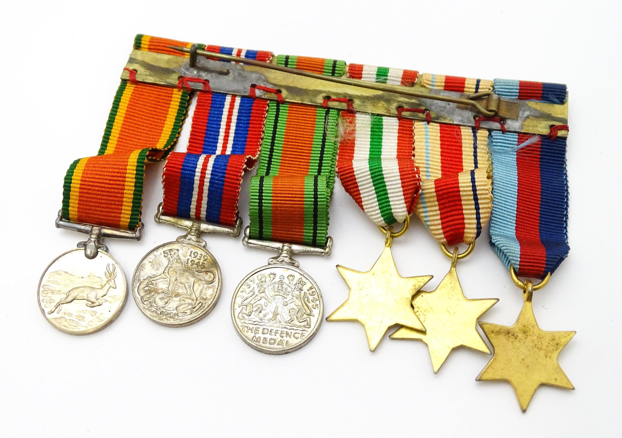 Militaria : a quantity of 20thC medals and insignia, comprising two WWI campaign medals to Gnr. W. - Image 2 of 16