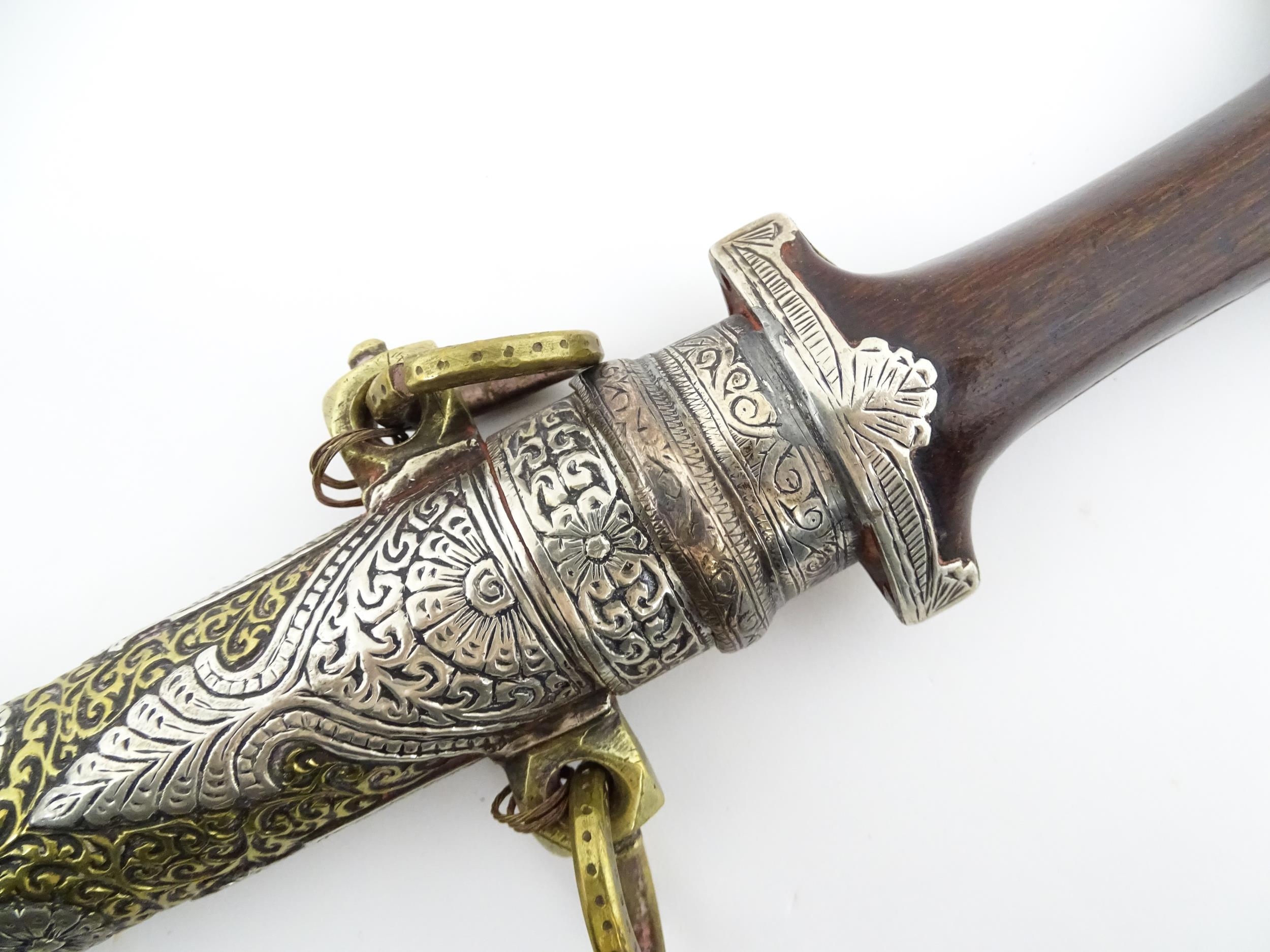 Ethnographic / Native / Tribal: A Moroccan Koummya / Jambiya dagger with carved wooden handle with - Image 5 of 14
