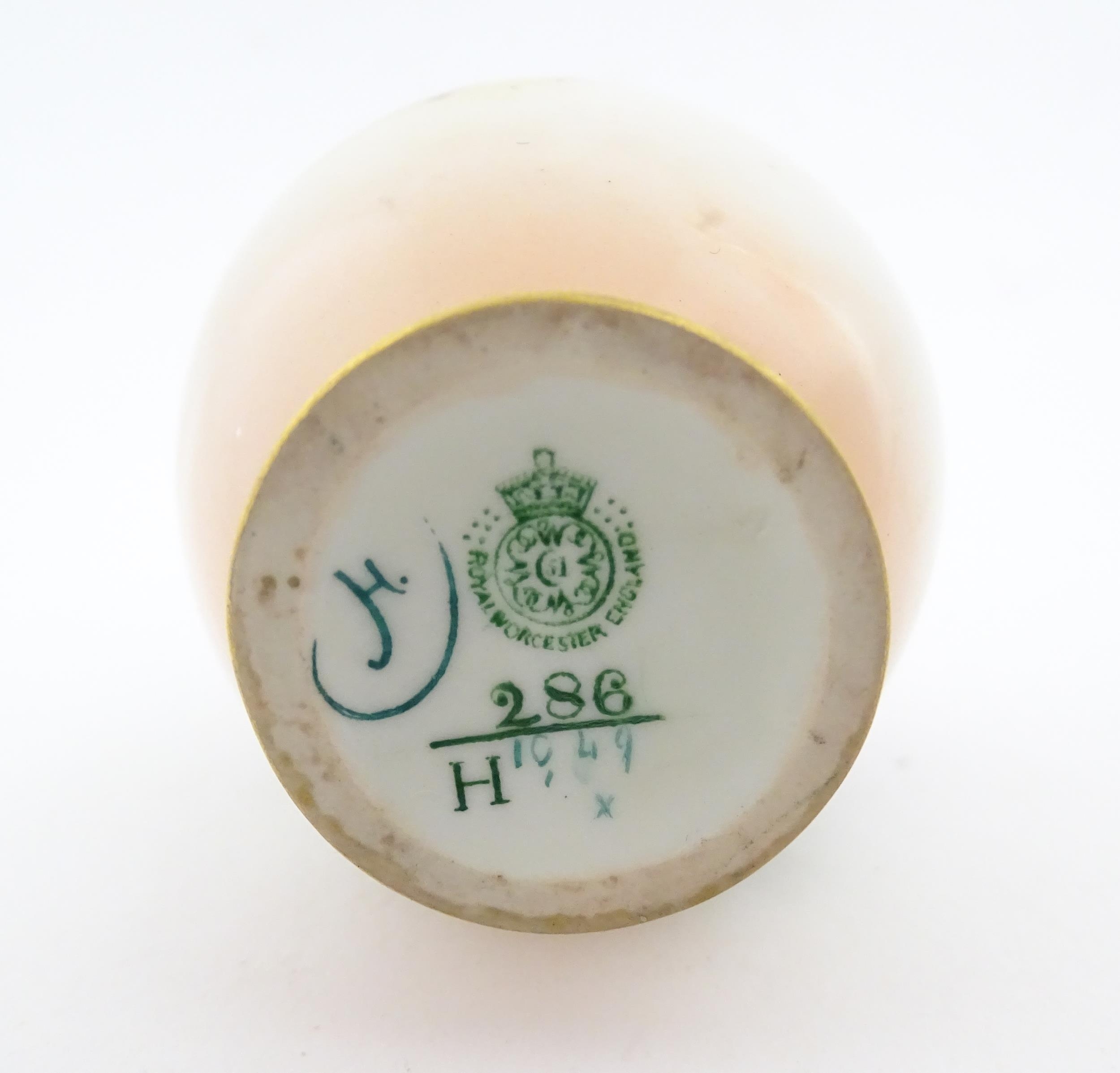 A Royal Worcester vase with hand painted decoration depicting pink and yellow roses, with gilt - Image 2 of 7