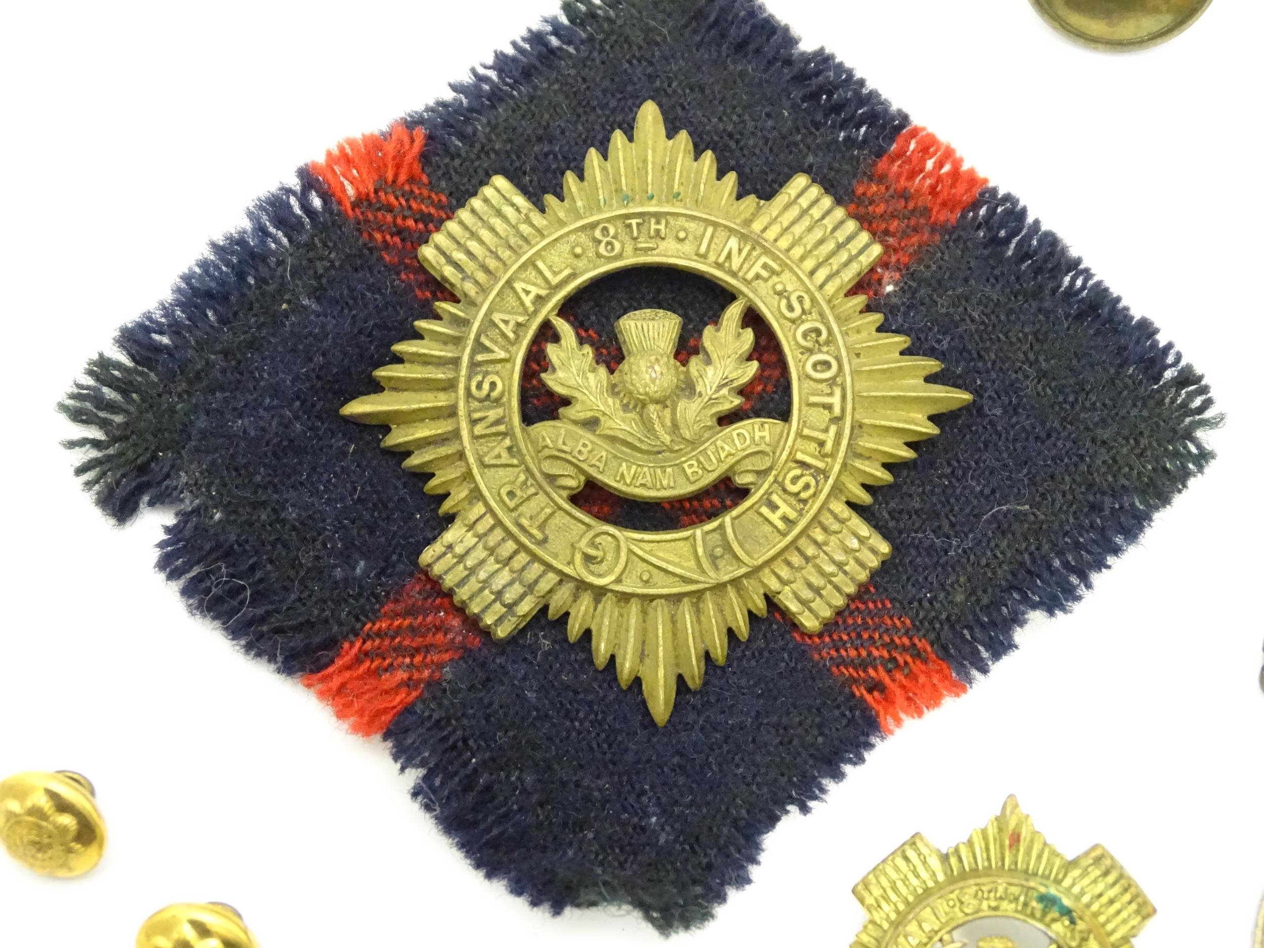 Militaria : a quantity of 20thC medals and insignia, comprising two WWI campaign medals to Gnr. W. - Image 5 of 16