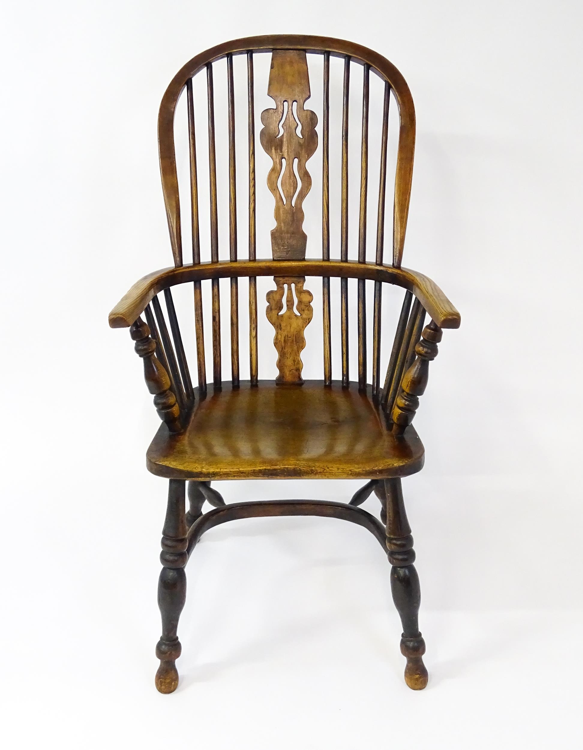 A mid 19thC ash and elm Windsor chair with a double bowed backrest and a pierced back splat above - Image 3 of 9