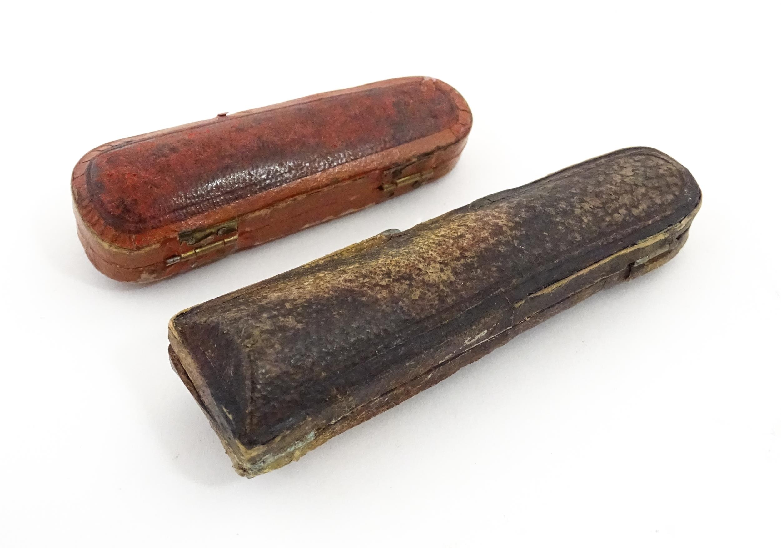 Two amber cheroot mouthpiece holders with white metal mounts, one with meerschaum detail. On - Image 2 of 8