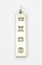 A silver pendant of ingot form, hallmarked Birmingham 197. Approx. 1 3/4" long Please Note - we do