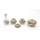 Three Japanese pots and covers decorated in the Satsuma palette with figures, Mount Fuji landscapes,
