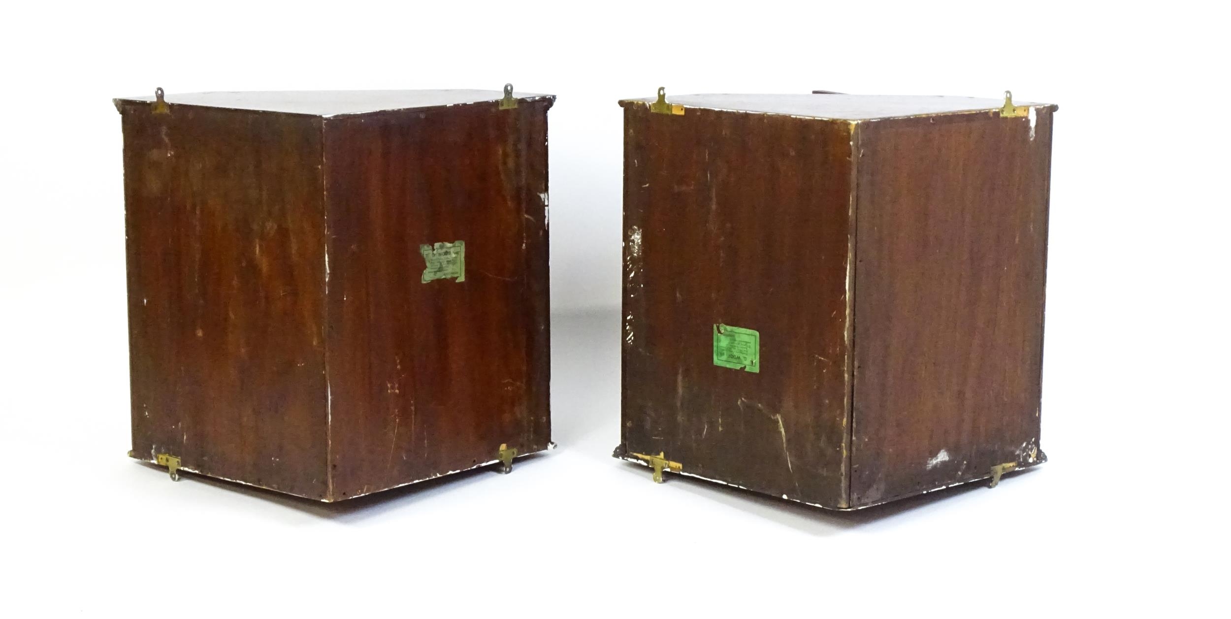 A pair of mid 20thC walnut corner cabinets. Bearing labels to back panels. 21 1/2 high x 26" wide - Image 7 of 7