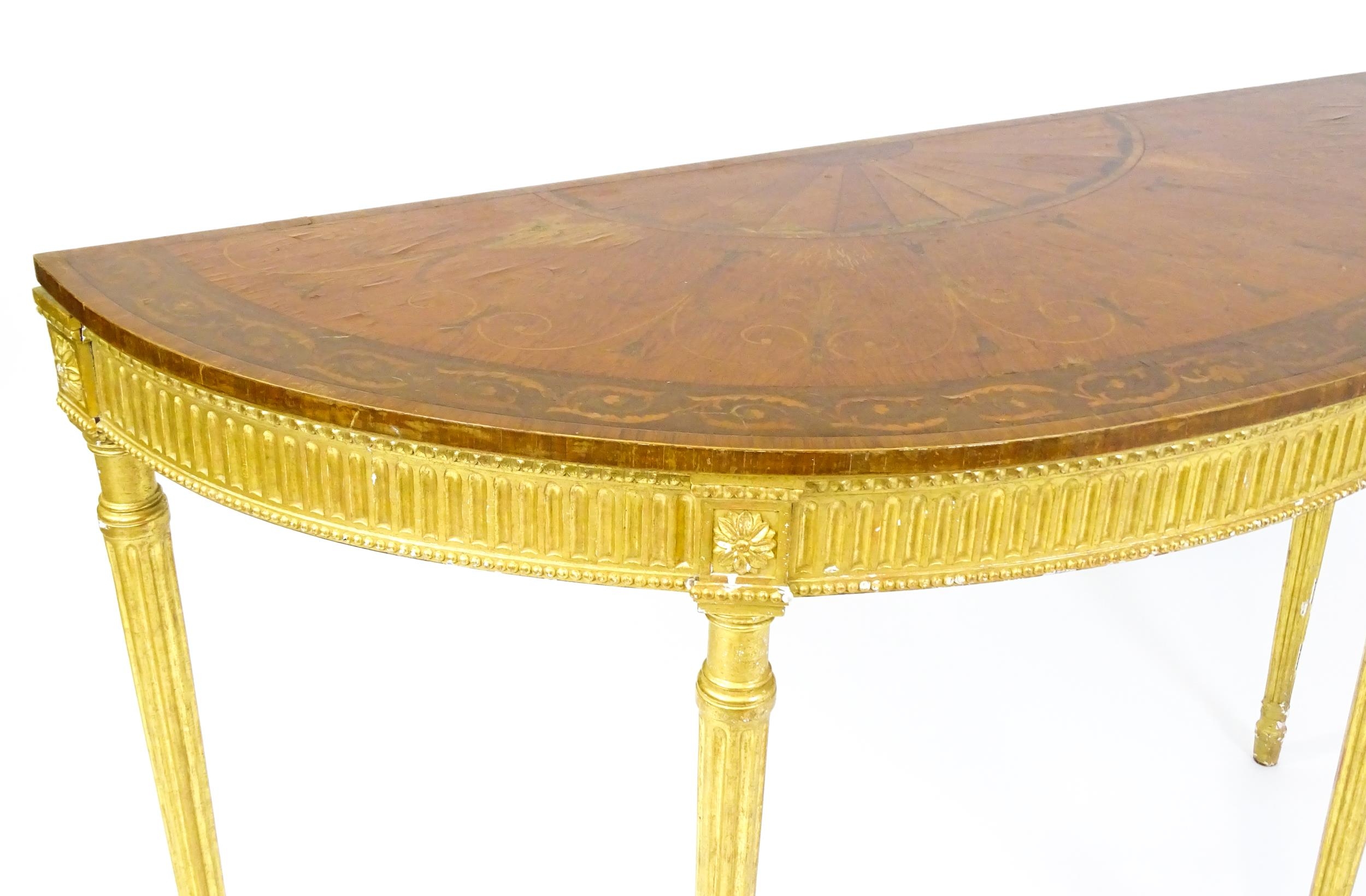 A demi lune console table with a marquetry inlaid top above a fluted frieze and moulded floral - Image 11 of 11