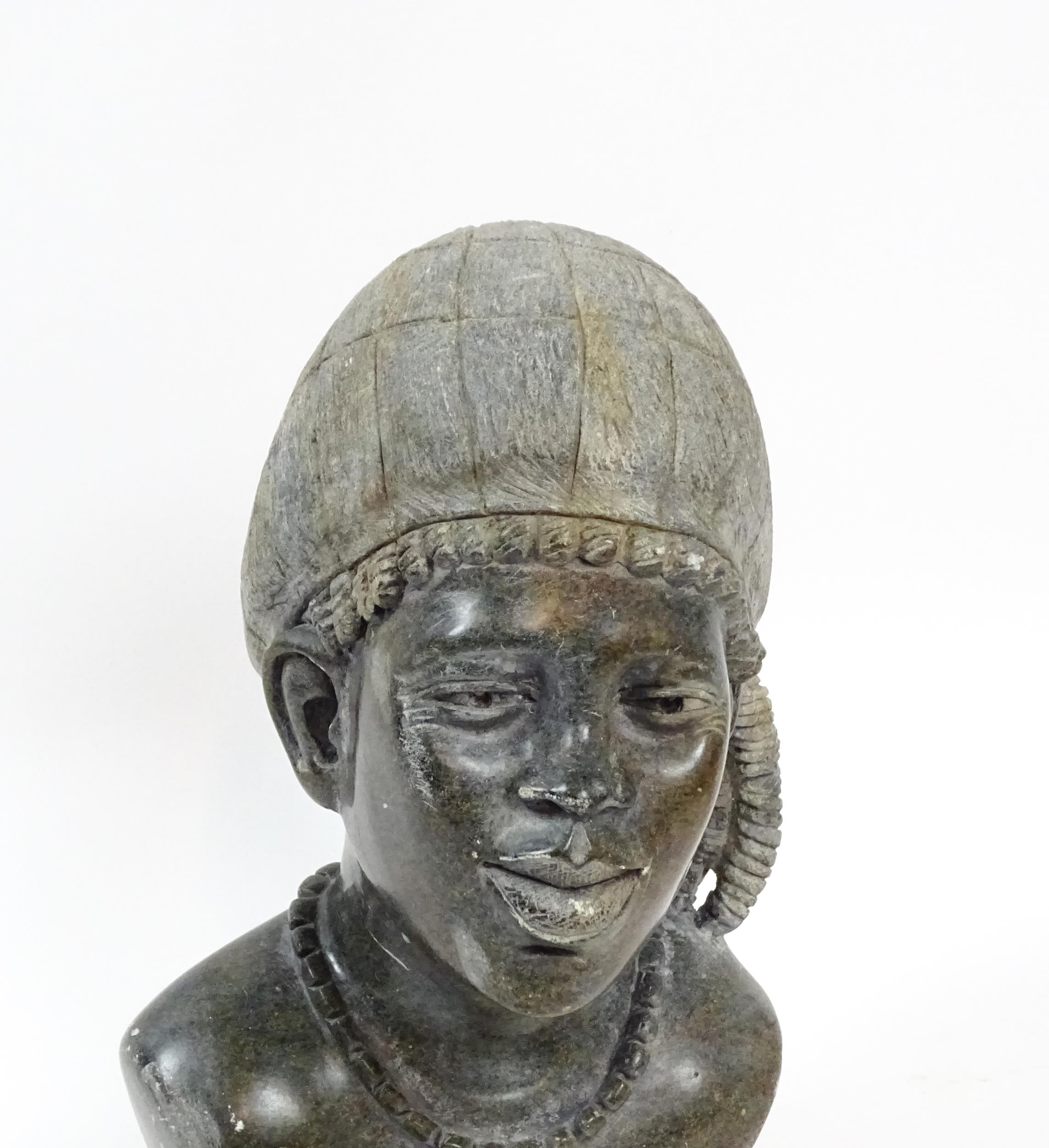 Ethnographic / Native / Tribal : An African carved soapstone bust modelled as a woman wearing a - Image 5 of 6
