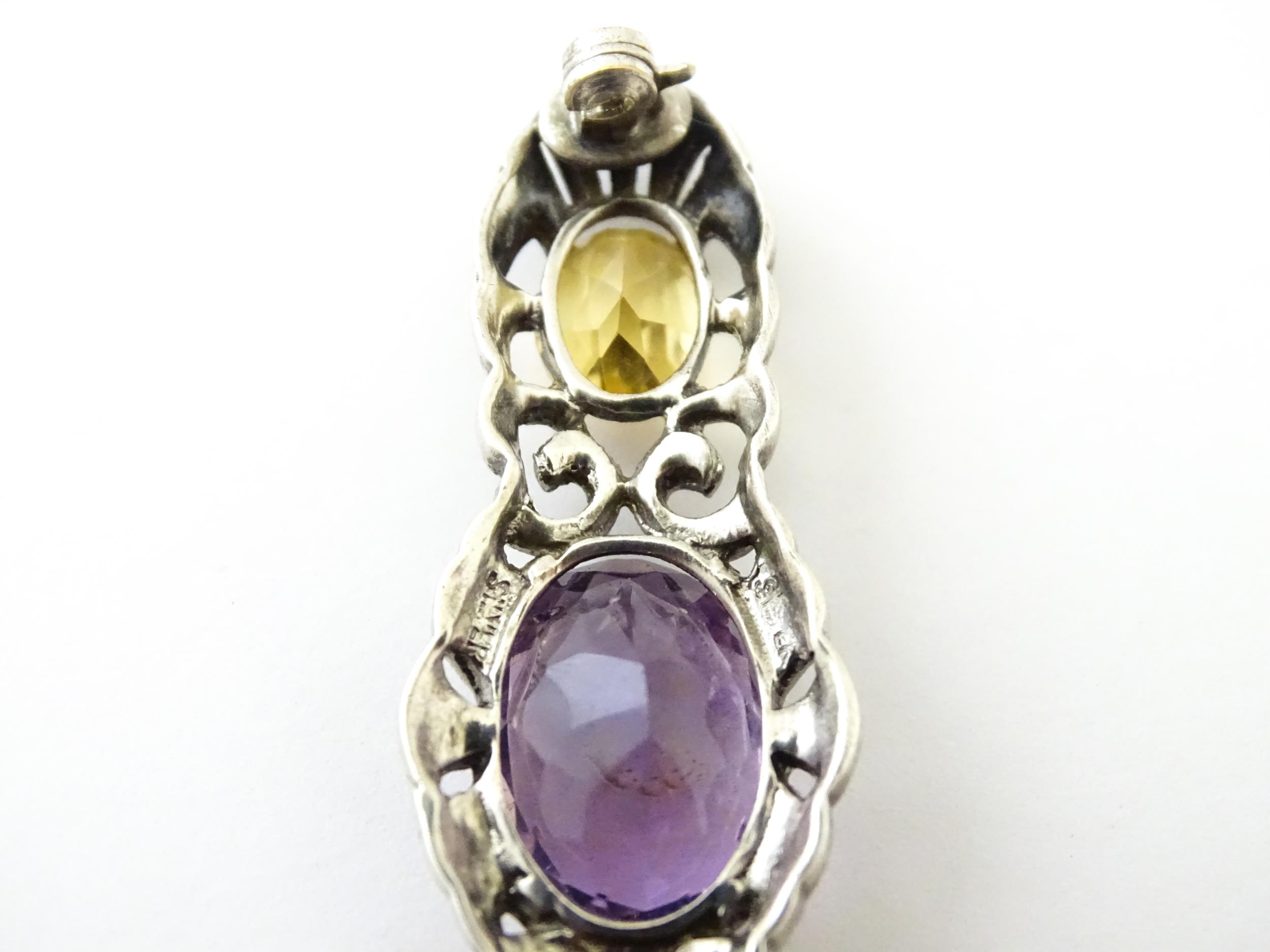 A silver brooch set with amethyst, citrine and marcasite. Approx 2 1./4" wide Please Note - we do - Image 8 of 8