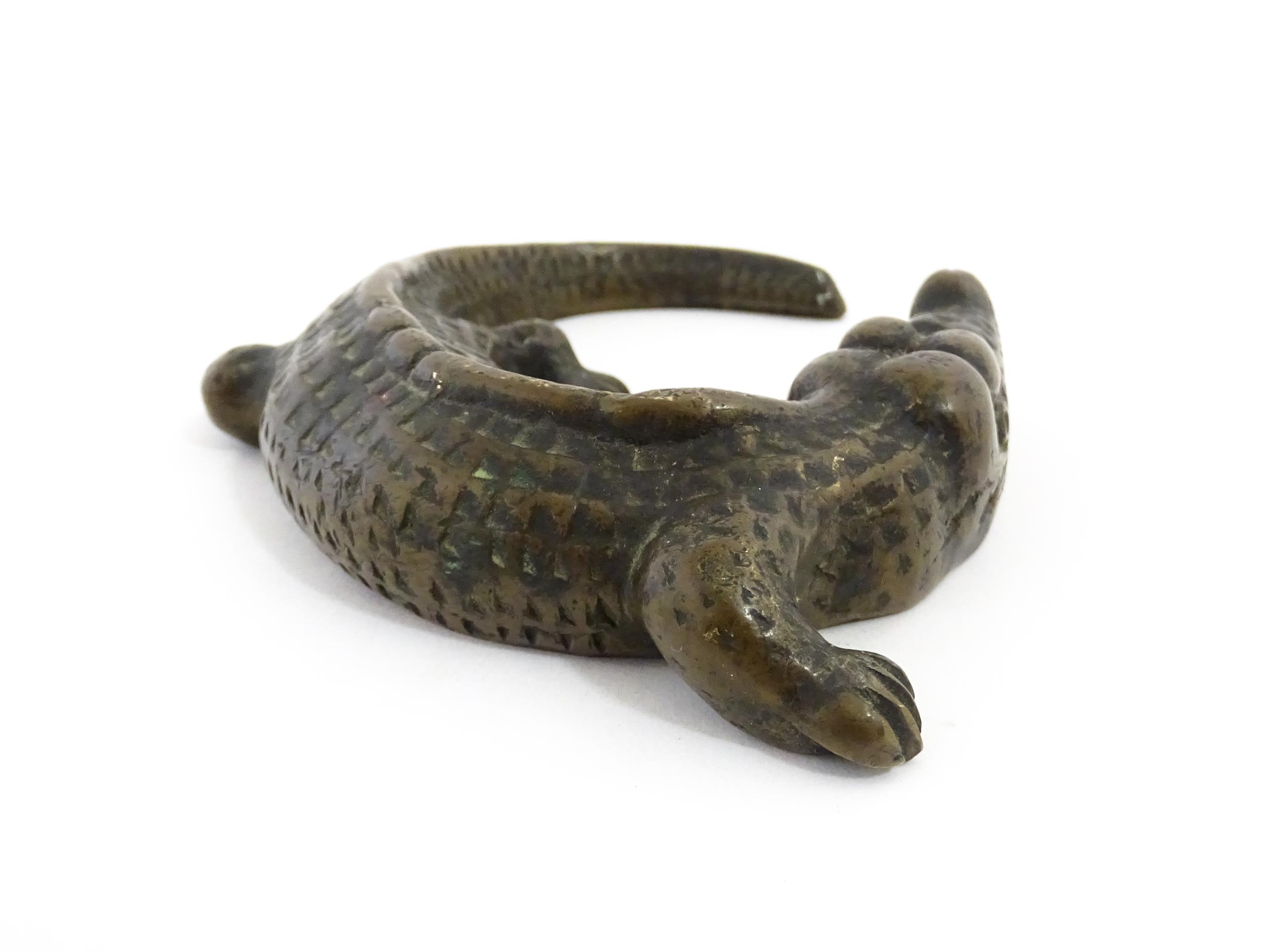 A 20thC cast bronze model of a crocodile / alligator. Approx. 5 1/4" wide Please Note - we do not - Image 5 of 7