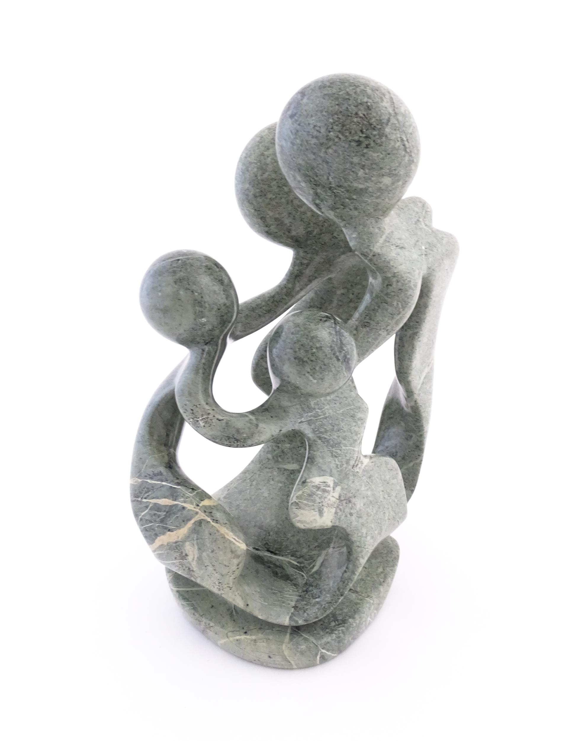 An African carved soapstone sculpture Family of Four, depicting four stylised figures, by Agrippa - Image 6 of 9