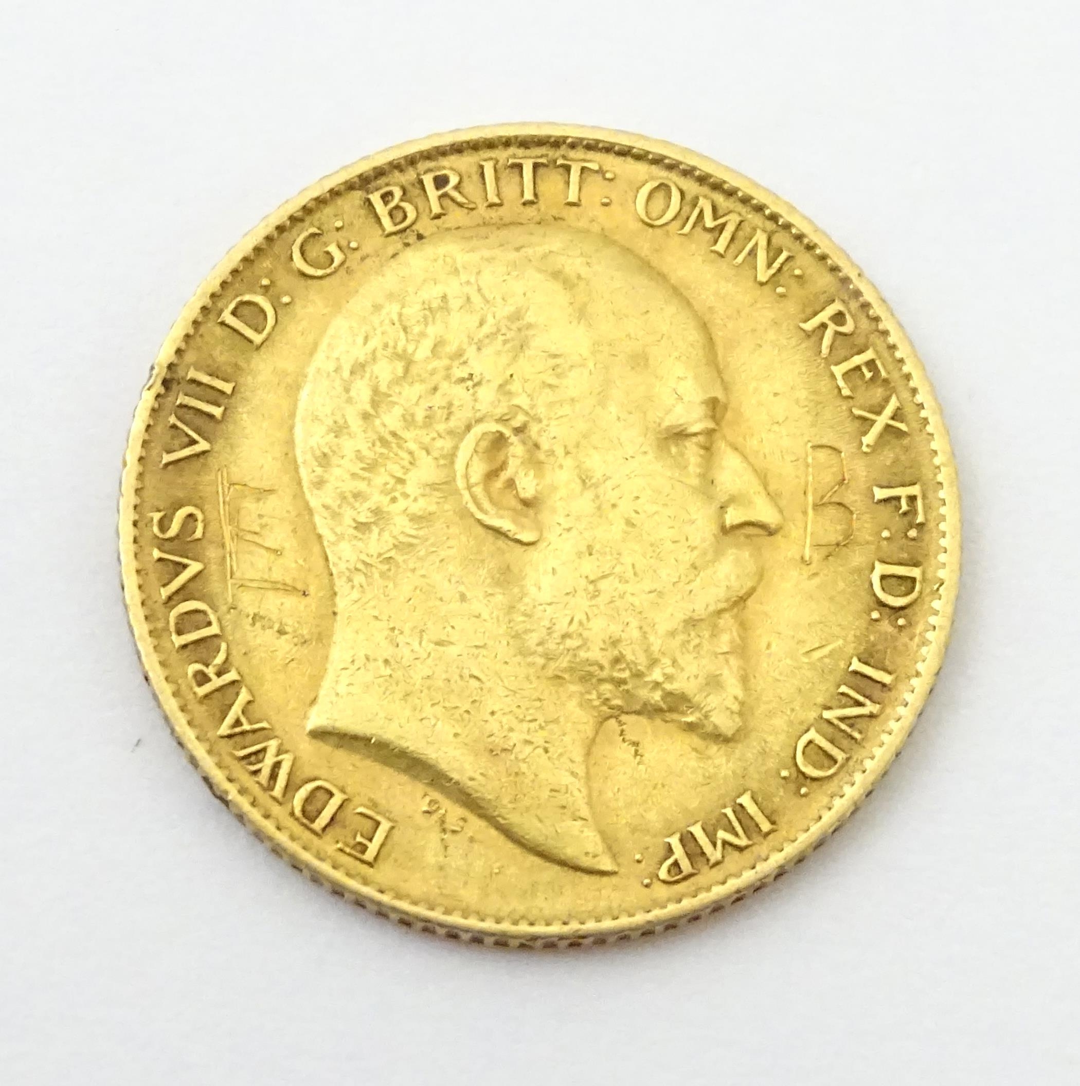Coin: An Edward VII 1909 gold half sovereign (3.9g) Please Note - we do not make reference to the