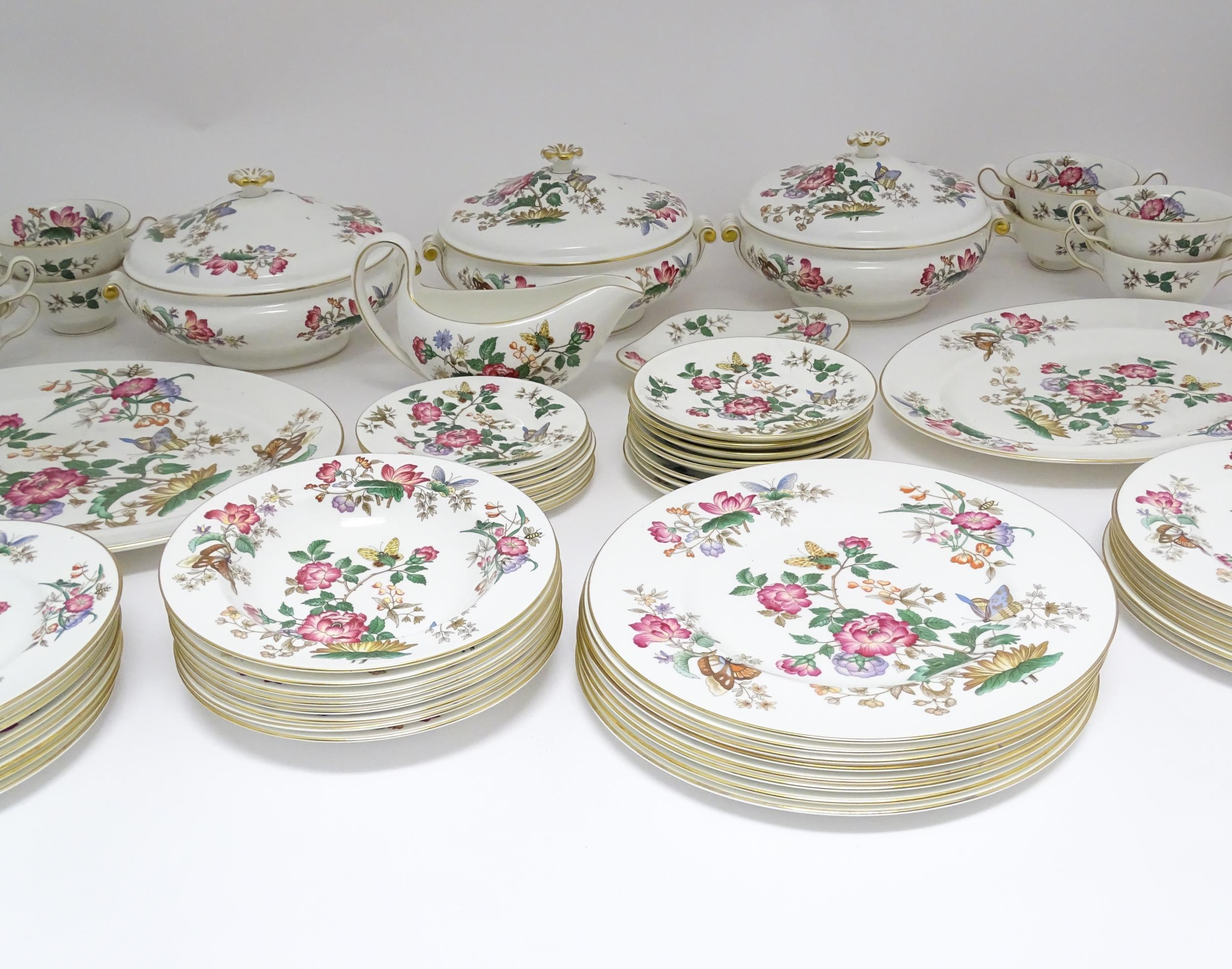A quantity of Wedgwood dinner wares in the Charnwood pattern to include plates, twin handles soup - Image 10 of 25