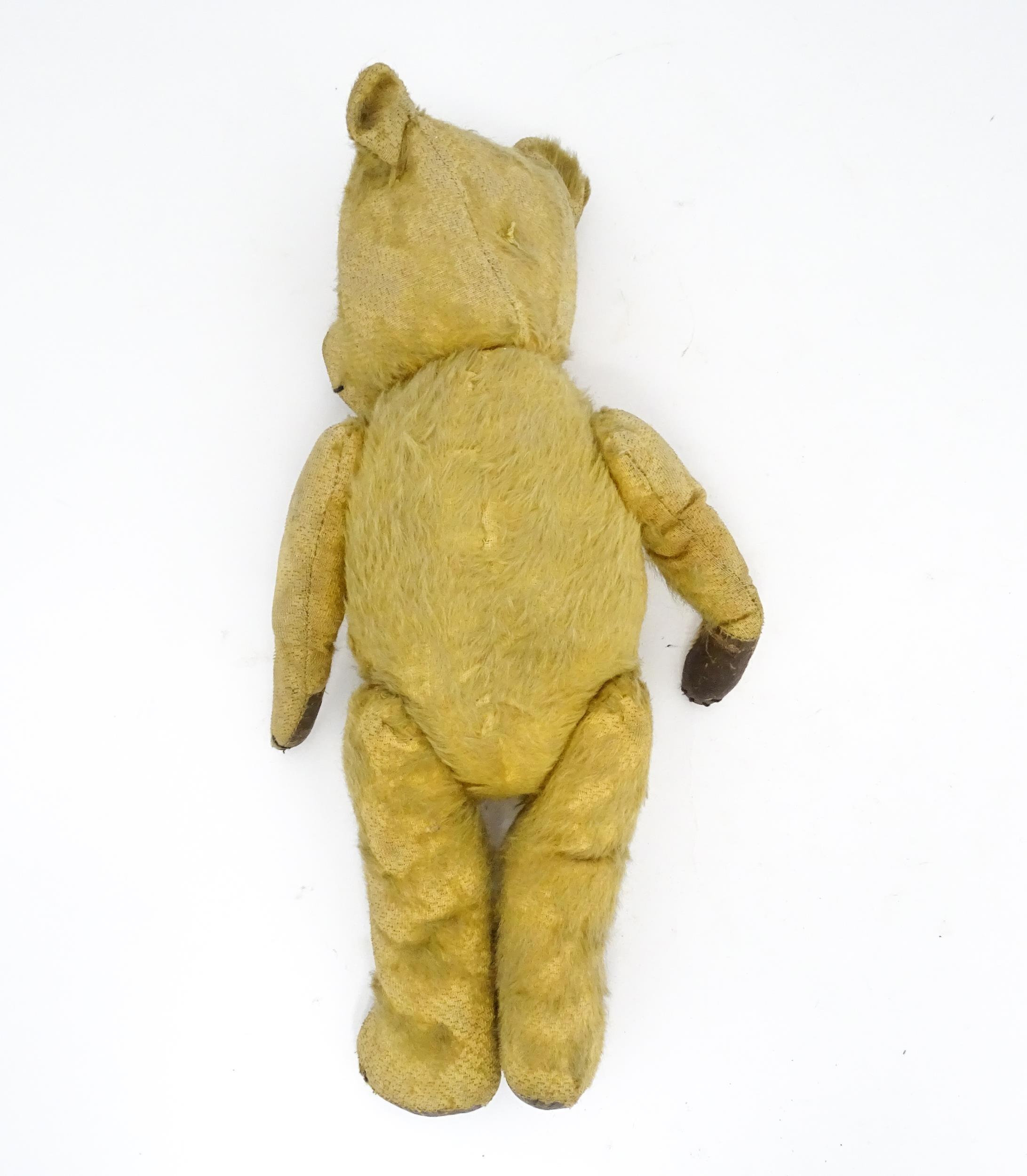 Toy: An early 20thC mohair straw filled teddy bear with stitched nose and mouth, articulated limbs - Image 7 of 8