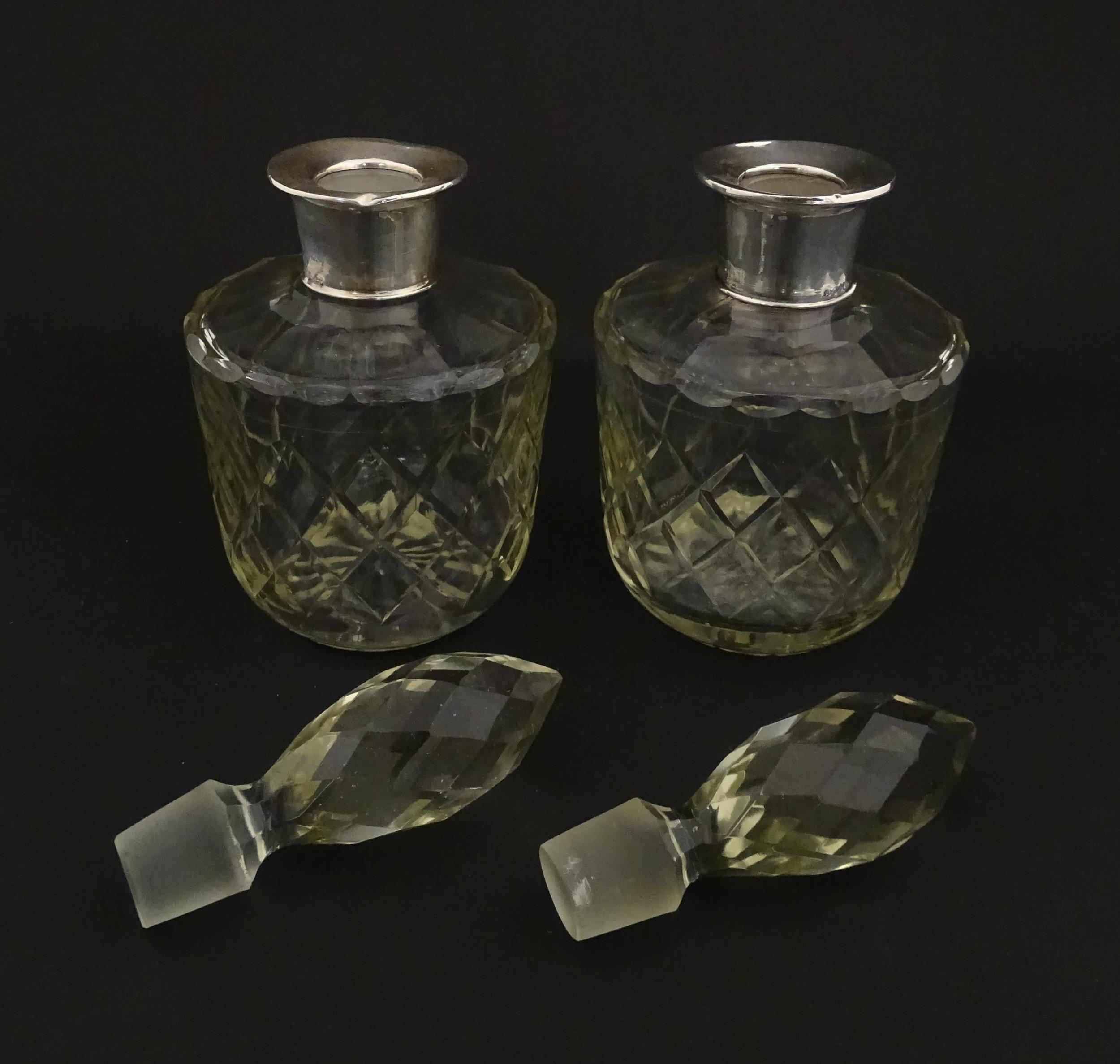 Two glass flasks formed as small cut glass decanters with Argentinian .925 silver mounts. Approx. 8" - Image 3 of 10