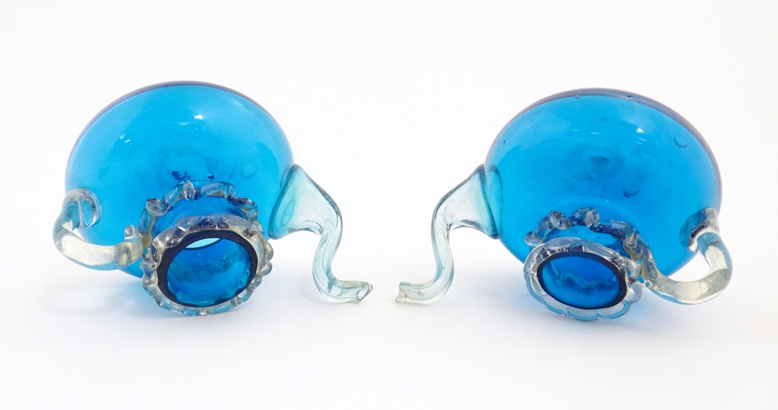 An unusual pair of turquoise glass oil / vinegar bottles of teapot form, the lids surmounted by - Image 2 of 11