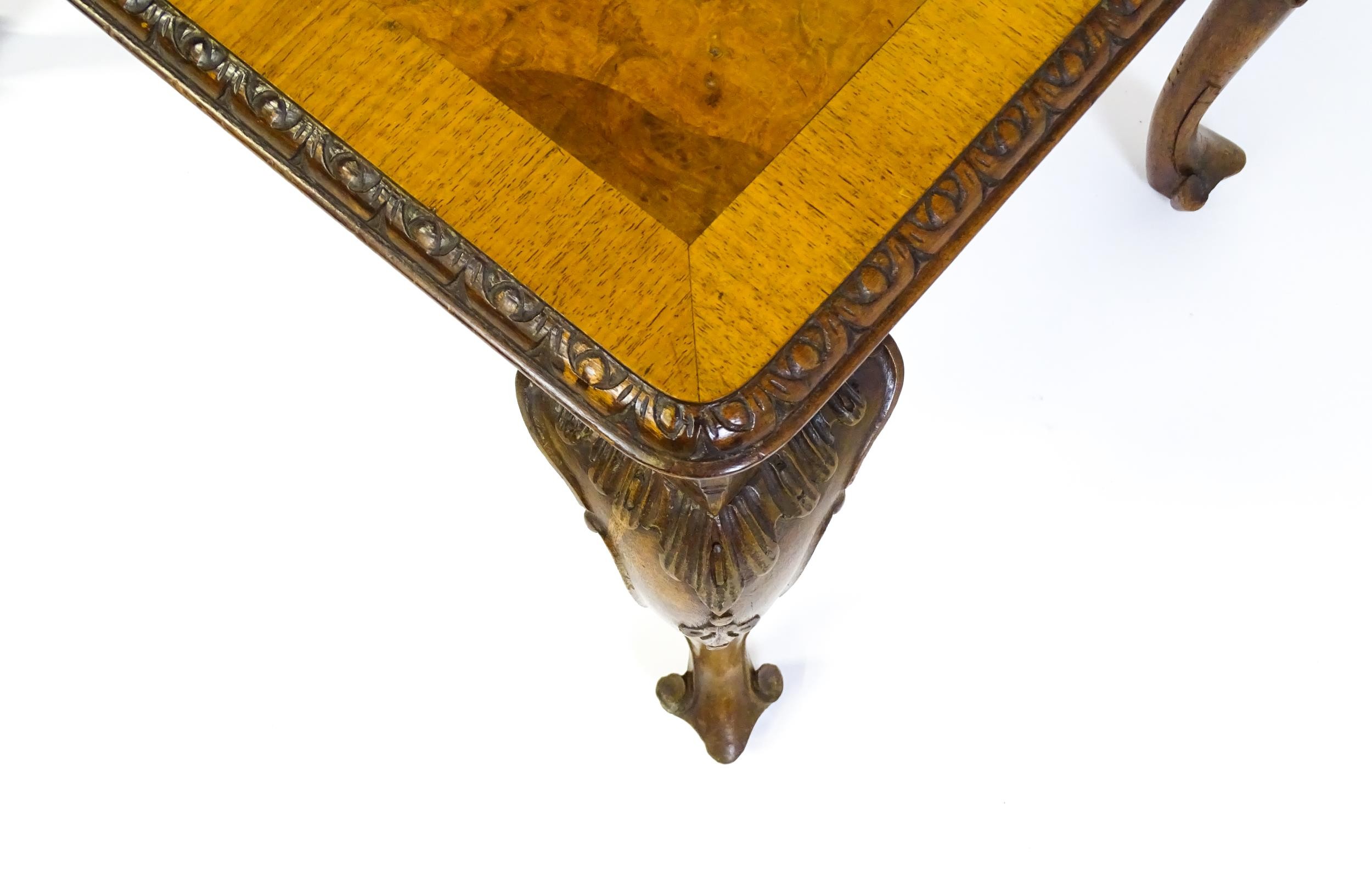 A mid / late 20thC coffee table with a burr walnut veneered top, with an egg and dart moulded edge - Bild 7 aus 8