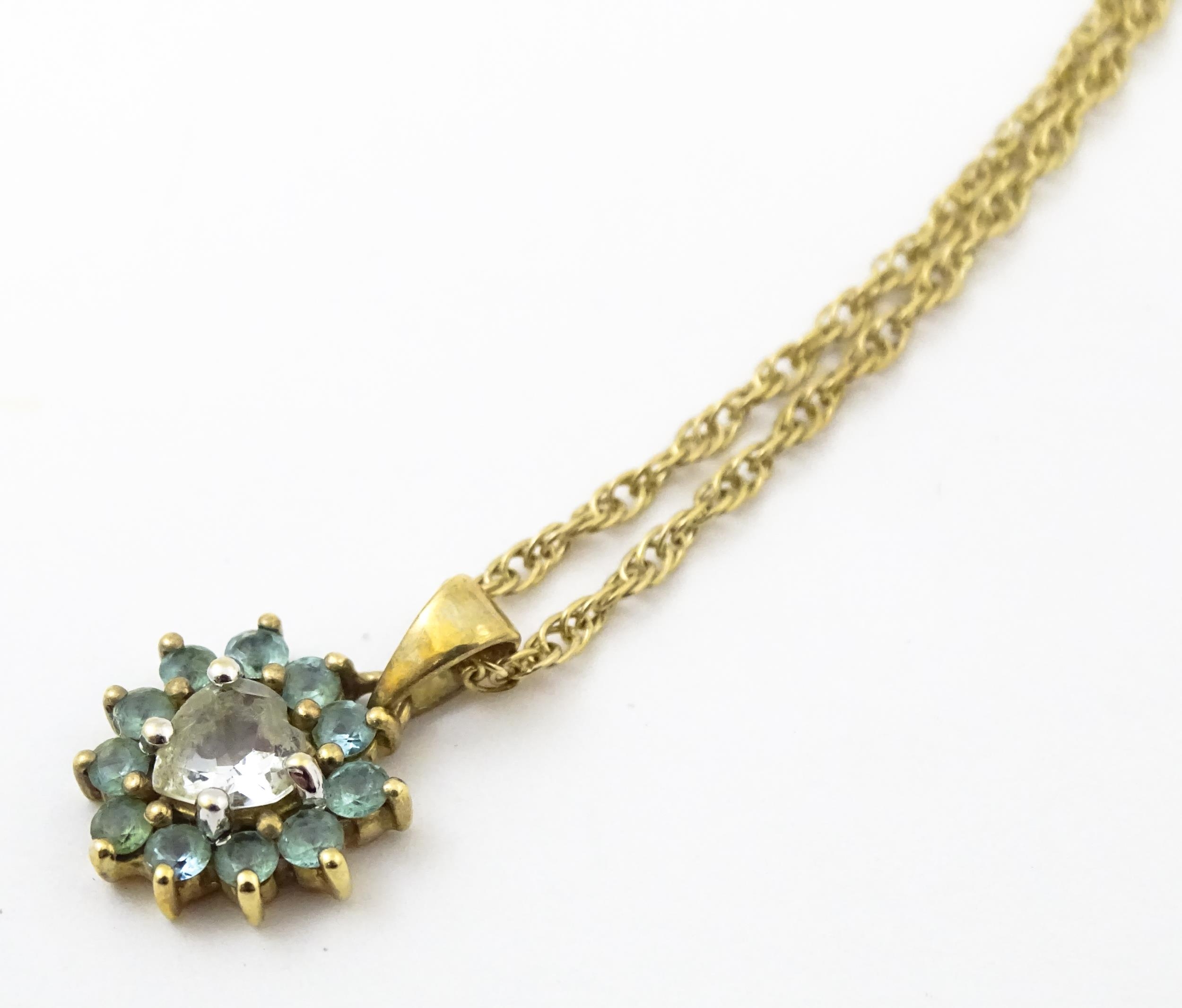 9ct gold pendant set with white and aqua coloured stones, with chain necklace. The chain approx - Image 7 of 10