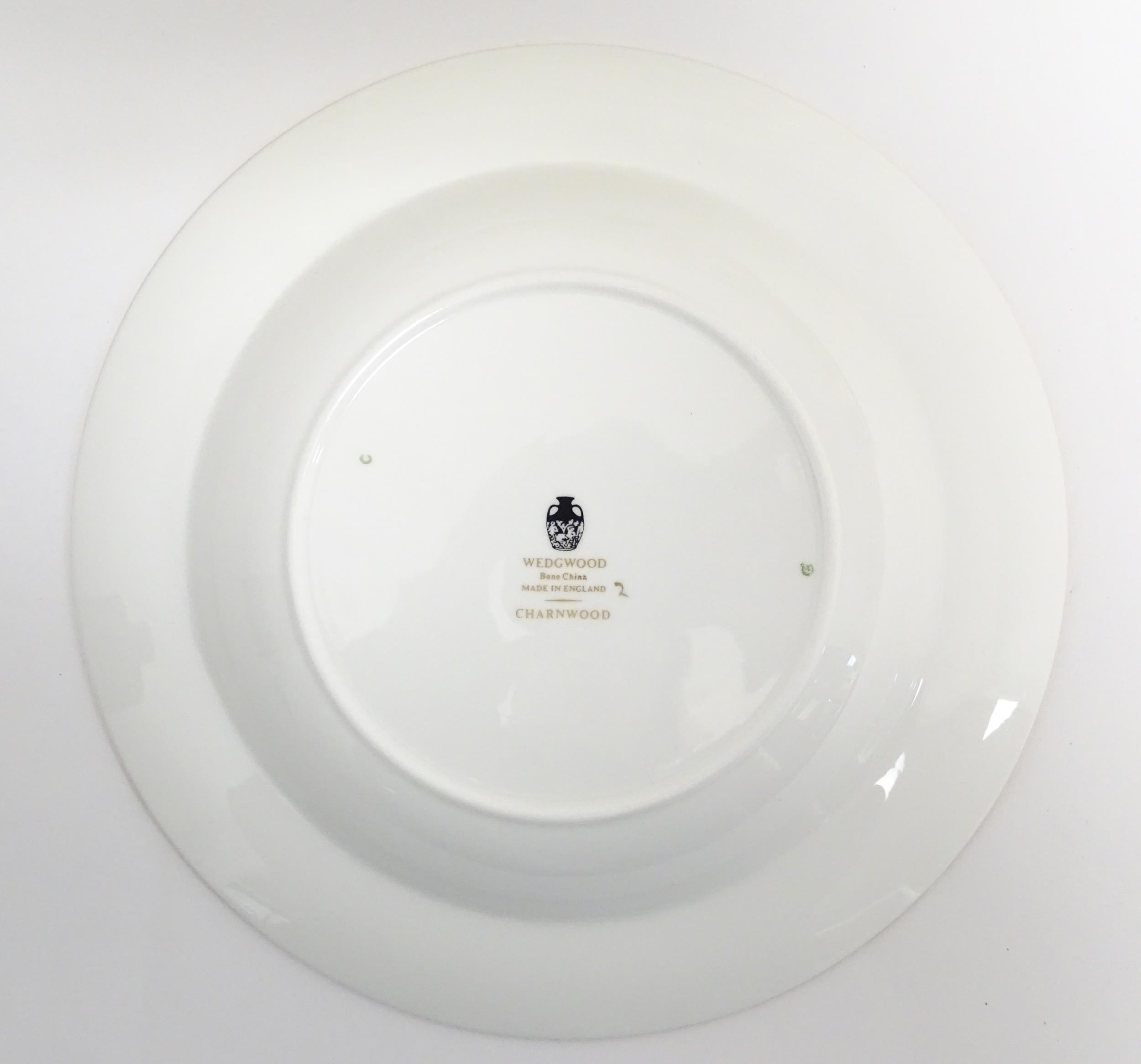 A quantity of Wedgwood dinner wares in the Charnwood pattern to include plates, twin handles soup - Image 17 of 25